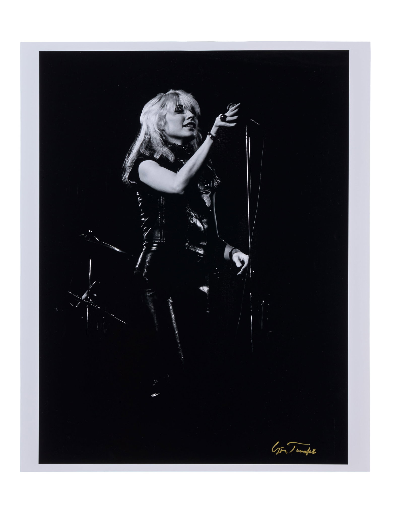 Blondie | 1978 Stockholm Performance Photos Signed by Photographer Goran Tannfelt: A collection of three black and white photographs of Blondie taken during their performance at the Jarla Theatre, Stockholm on February 19th, 1978. The images are primarily of Debbie Harry. They were 