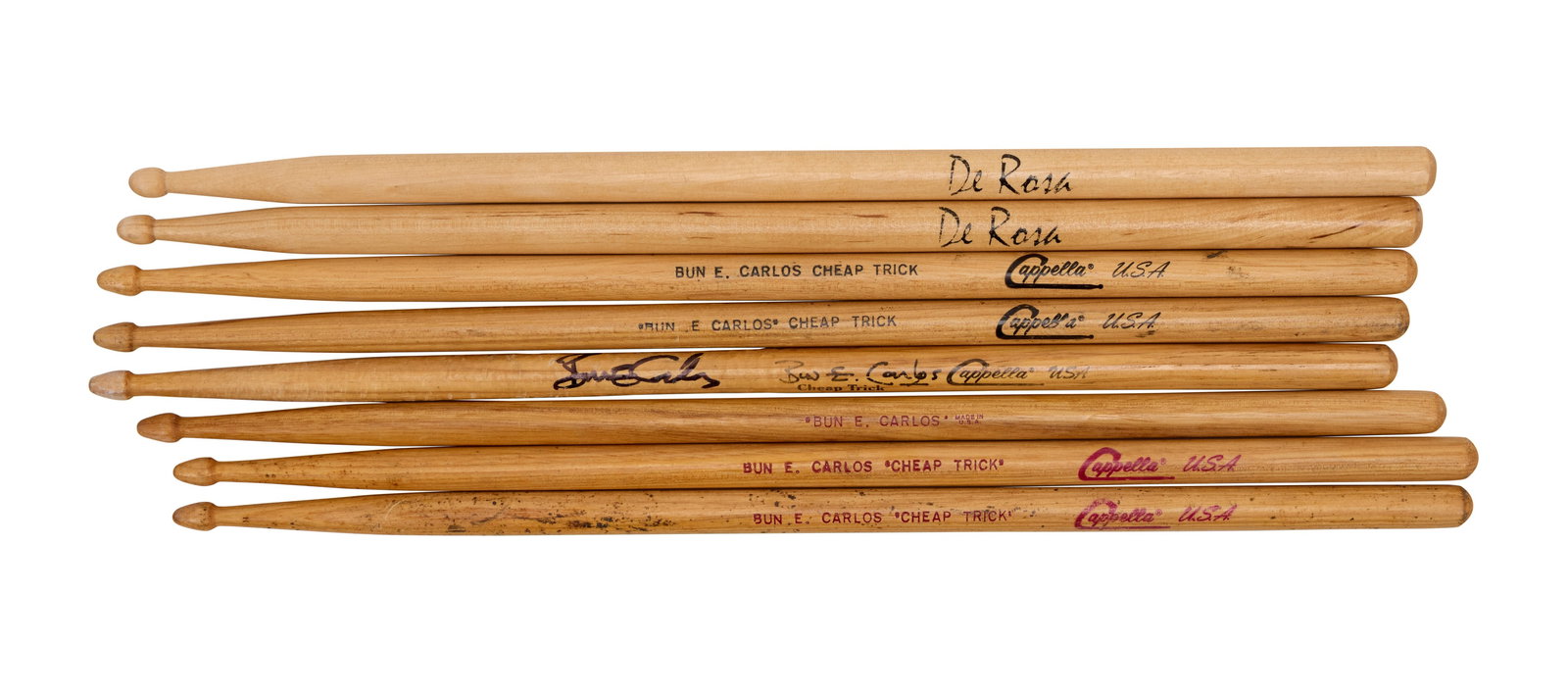 Cheap Trick | Bun E. Carlos Drumsticks, One Signed: Four sets of concert-used Bun E. Carlos signature drumsticks, one stick signed in black Sharpie by Carlos. 