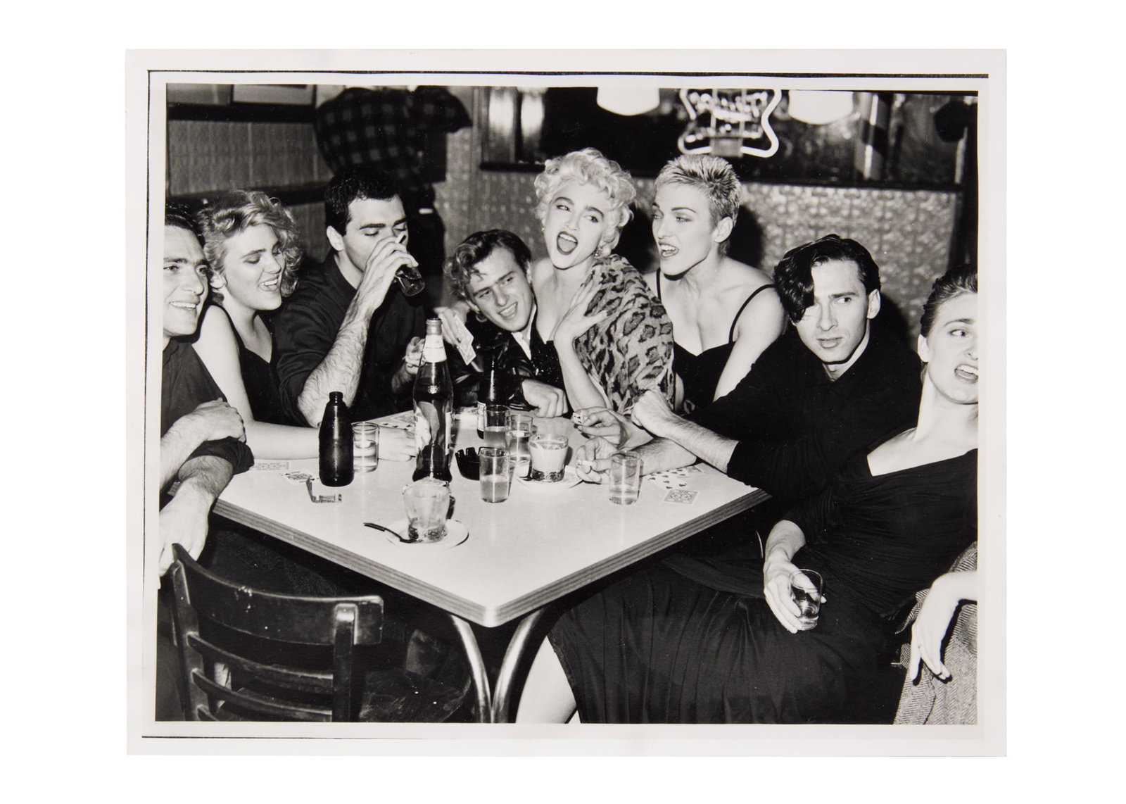 Madonna | Bruce Weber Photo: A Bruce Weber black-and-white photograph of Madonna and her entourage. Labeled on the verso in pencil. The image appeared in the cover story on Madonna in the December 2006 edition of LIFE magazine.
