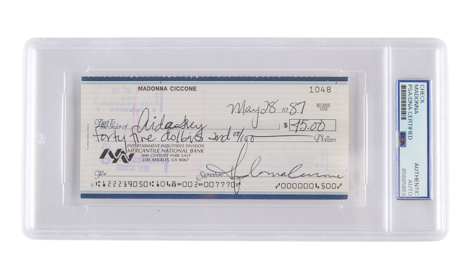 Madonna | 1987 Signed Check: A Madonna Ciccone check for $45, dated May 28, 1987 and signed by her in black ink. Slabbed with unique authentication number.