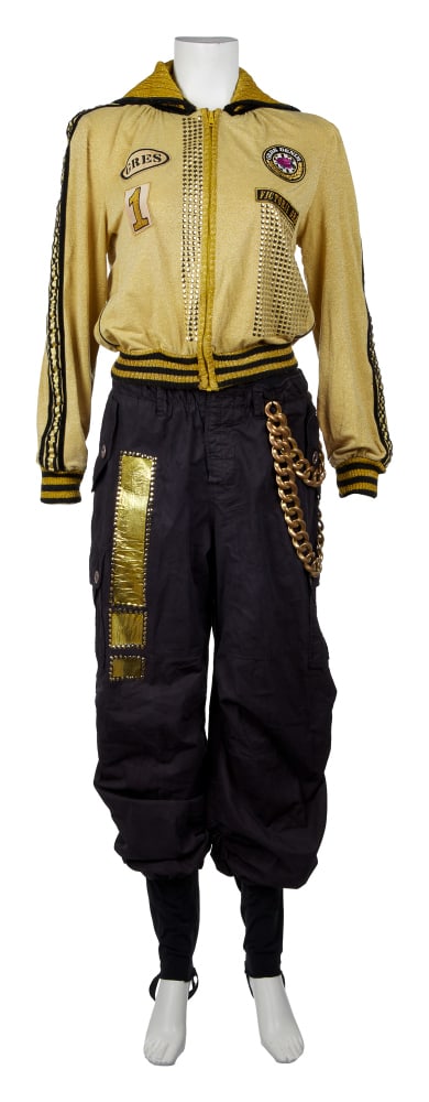 Janet Jackson | 2008 "Rock Withchu" Tour Stage-Worn Jumpsuit: A long-sleeve black and white jumpsuit with faux leather attachments worn by Janet Jackson while performing on her 2008 "Rock Witchu" tour. The jumpsuit features a white long-sleeve shirt top with