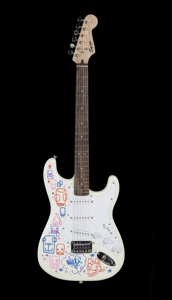 Linkin Park | Mike Shinoda Signed Squier Bullet Strat Electric Guitar With Hand Drawn Artwork: A 2017 Squier Bullet Strat electric guitar serial #ICS17078521 in white finish and signed by Mike Shinoda of Linkin Park with hand-drawn artwork throughout the body top. Shinoda has signed the guitar