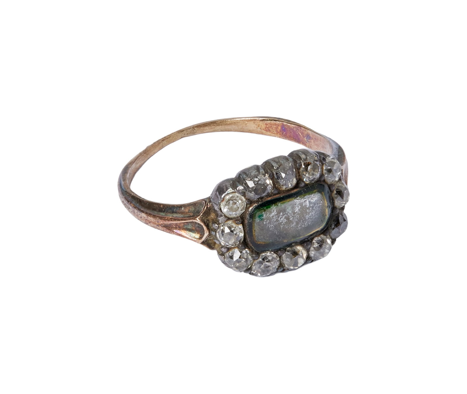 Tracee Mae Miller | Antique Georgian Memorial Ring Gifted By Renee Zellweger: An antique Georgian memorial ring, gifted to Tracee Mae Miller by Renee Zellweger as a birthday present when she was dating Jack White. Centering upon a cabochon paste glass panel, encasing a plait of