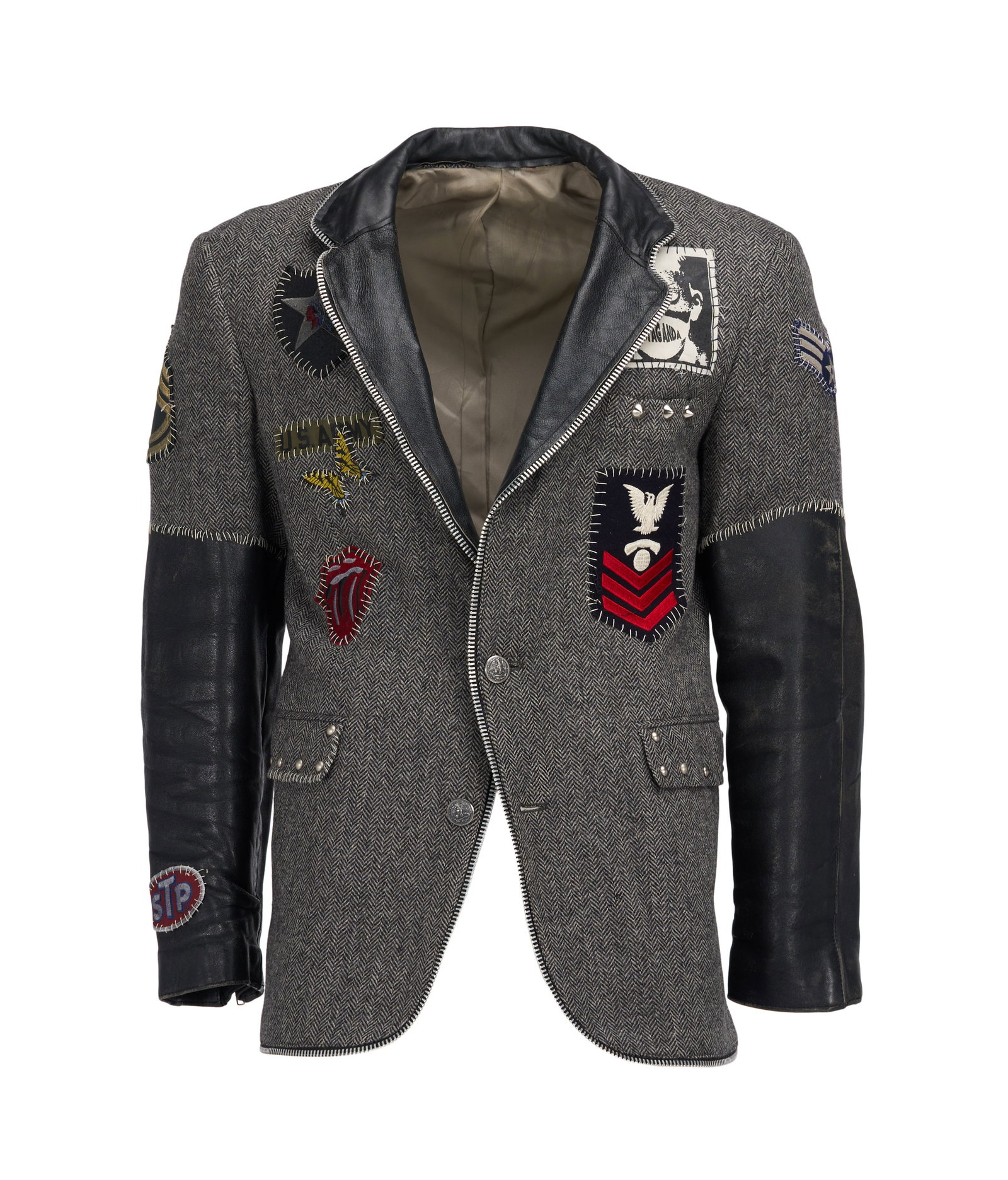 Usher | 2004 Billboard Music Award-Worn Jacket: A grey wool herringbone tweed and black leather jacket with patches, worn by Usher to the 2004 Billboard Music Awards held on December 8, 2004, at the MGM Grand Garden Arena in Las Vegas, NV. The jack