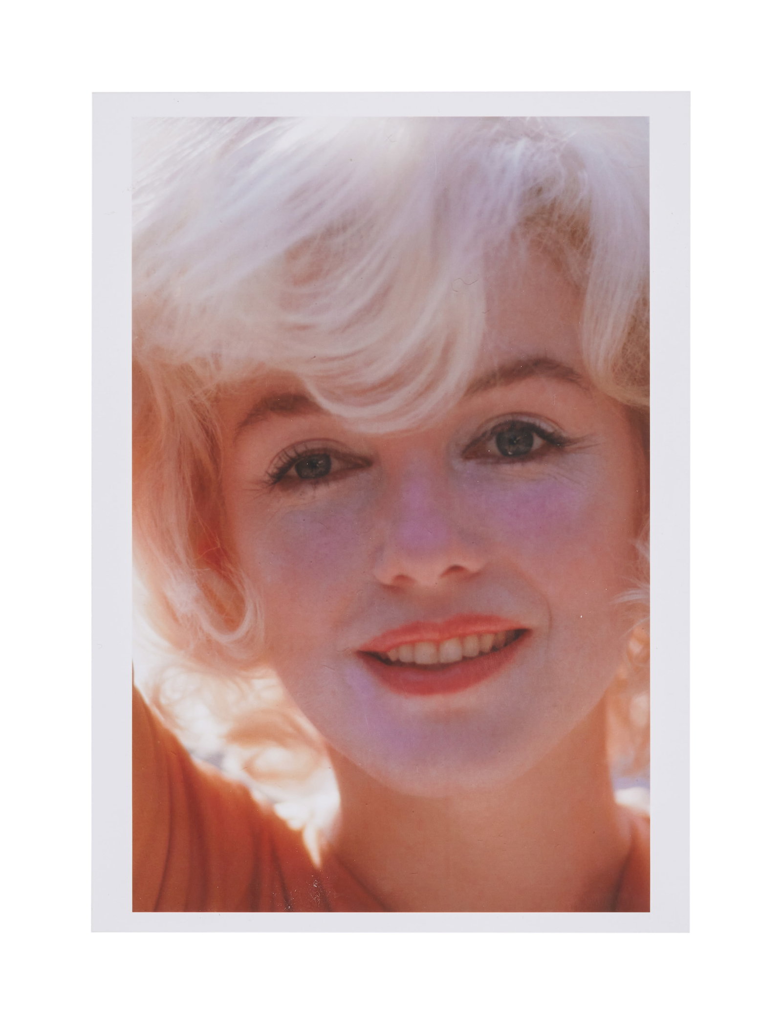 Marilyn Monroe | 1962/2006 Rare Color Photograph by Willy Rizzo: A 2006 later print; glossy finish, on Fujicolor Crystal Archive Paper, depicting a not-usually-seen close-up image of the star with a wistful look on her face as she wears orange-colored lipstick; ver