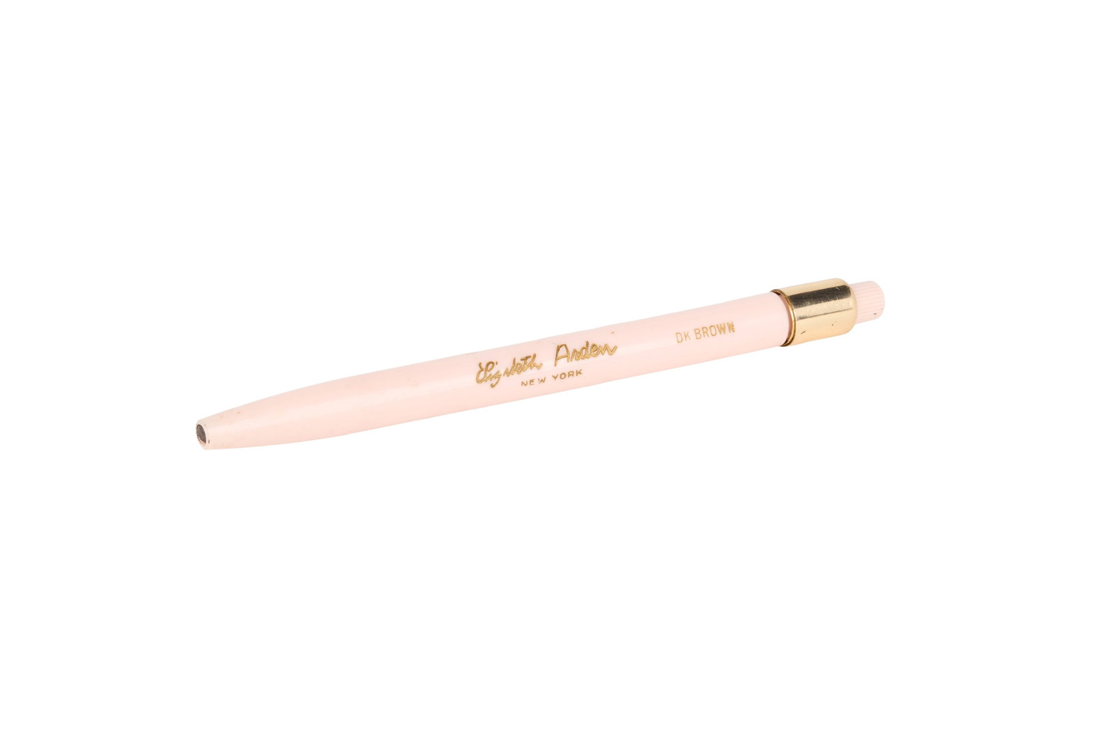 Marilyn Monroe | 1950s Eyeliner Pencil by Elizabeth Arden: A light pink cylindrical case; stamped on the side in gold-tone "Elizabeth Arden / New York / Dk Brown," still in working condition; from the star's personal possessions as inherited by Lee and Paula