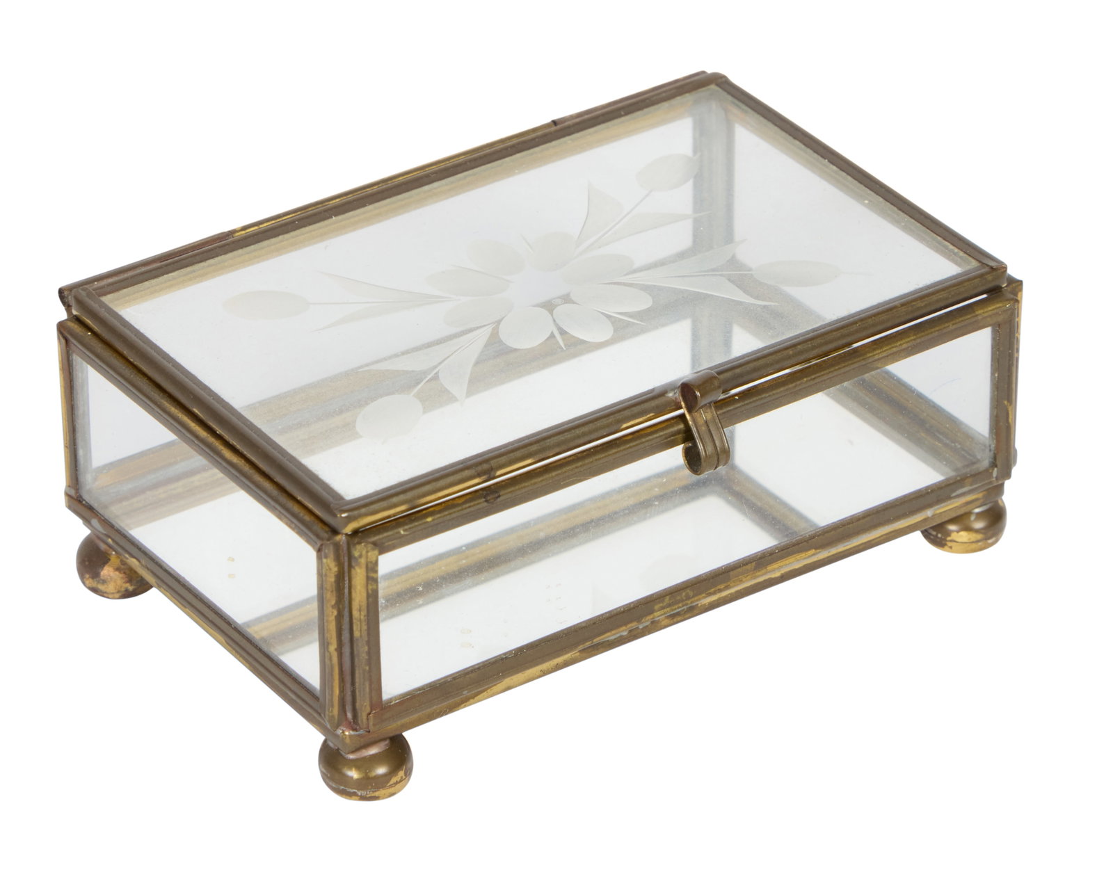 Marilyn Monroe | 1950s Trinket Box: A small piece made of glass; with a brass frame, inside bottom with a mirrored panel, top with an etched floral design, small latch on front; from the star's personal possessions as inherited by Lee a