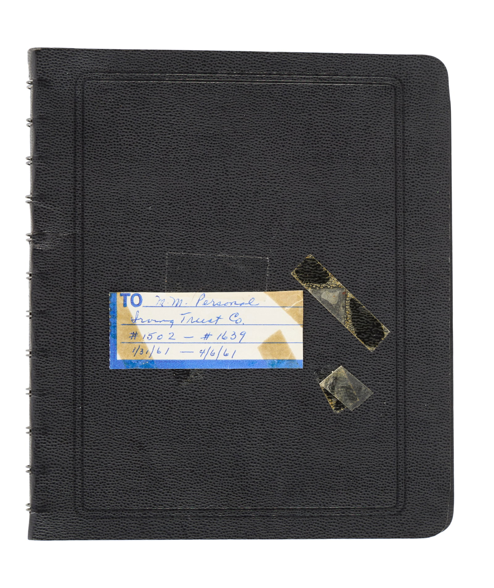 Marilyn Monroe | 1961 Personal Checkbook Stub Register: A black spiral bound binder; a label taped to the front has a blue ballpoint ink annotation reading in part "M.M. Personal / Irving Trust Co." [likely May Reis' hand], inside pages document the