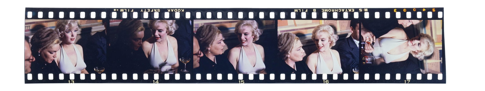 Marilyn Monroe | 1960/1970s Rare Color Transparency Film Strip: A circa 1970s later print; five separate positive images in a strip of Kodak Safety Film, each depicting the star sitting next to Simone Signoret (Arthur Miller and Yves Montand can just barely be see