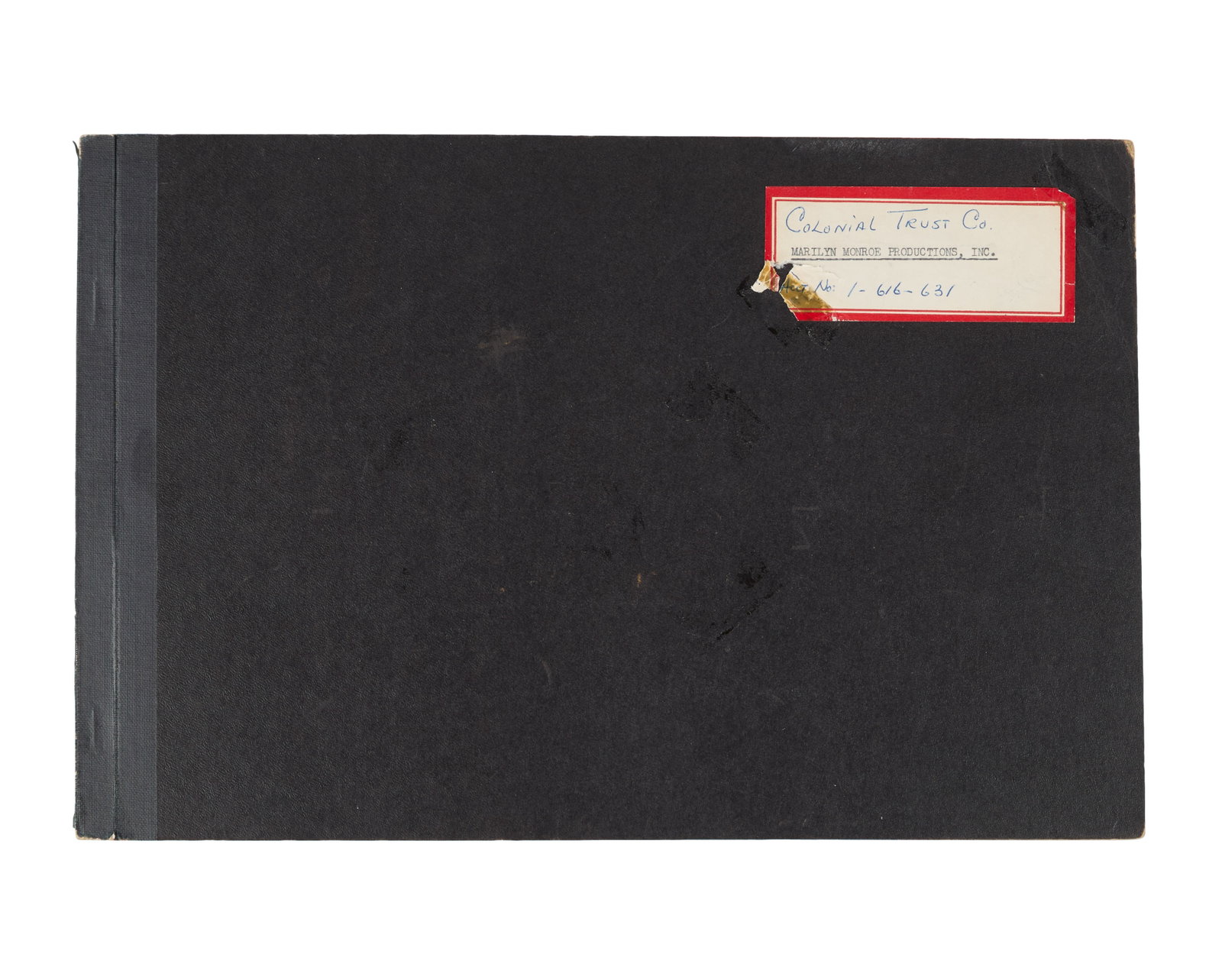 Marilyn Monroe | 1958-1959 Checkbook Stub Register: A black paper-bound binder; a label taped to the front has a typed note reading in part "Marilyn Monroe Productions, Inc.," inside pages document the checks written out from the star's business accoun