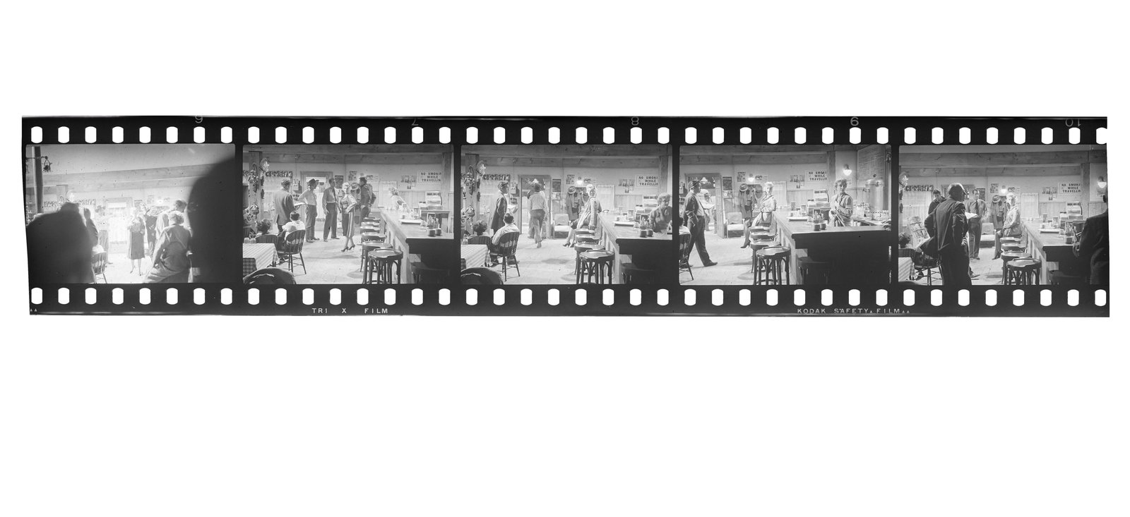 Marilyn Monroe | 1956 Black and White Negatives with Copyright by Milton H. Greene from "Bus Stop": 20th Century Fox 1956; a continuous strip of five, taken on the set by the star's then business partner, depicting her in the cafe scene as fellow actors surround her; included with the option to obta