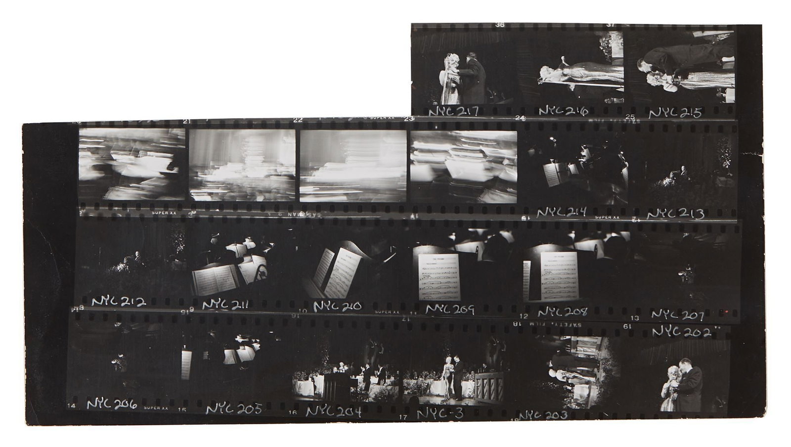 Marilyn Monroe | 1955 Black and White Contact Sheets by Milton H. Greene: A group of five separate sheets; original prints, glossy finish, depicting 18 unpublished images of the star at a Friars Club party that took place at the Waldorf Astoria Hotel in NYC on March 11, 195