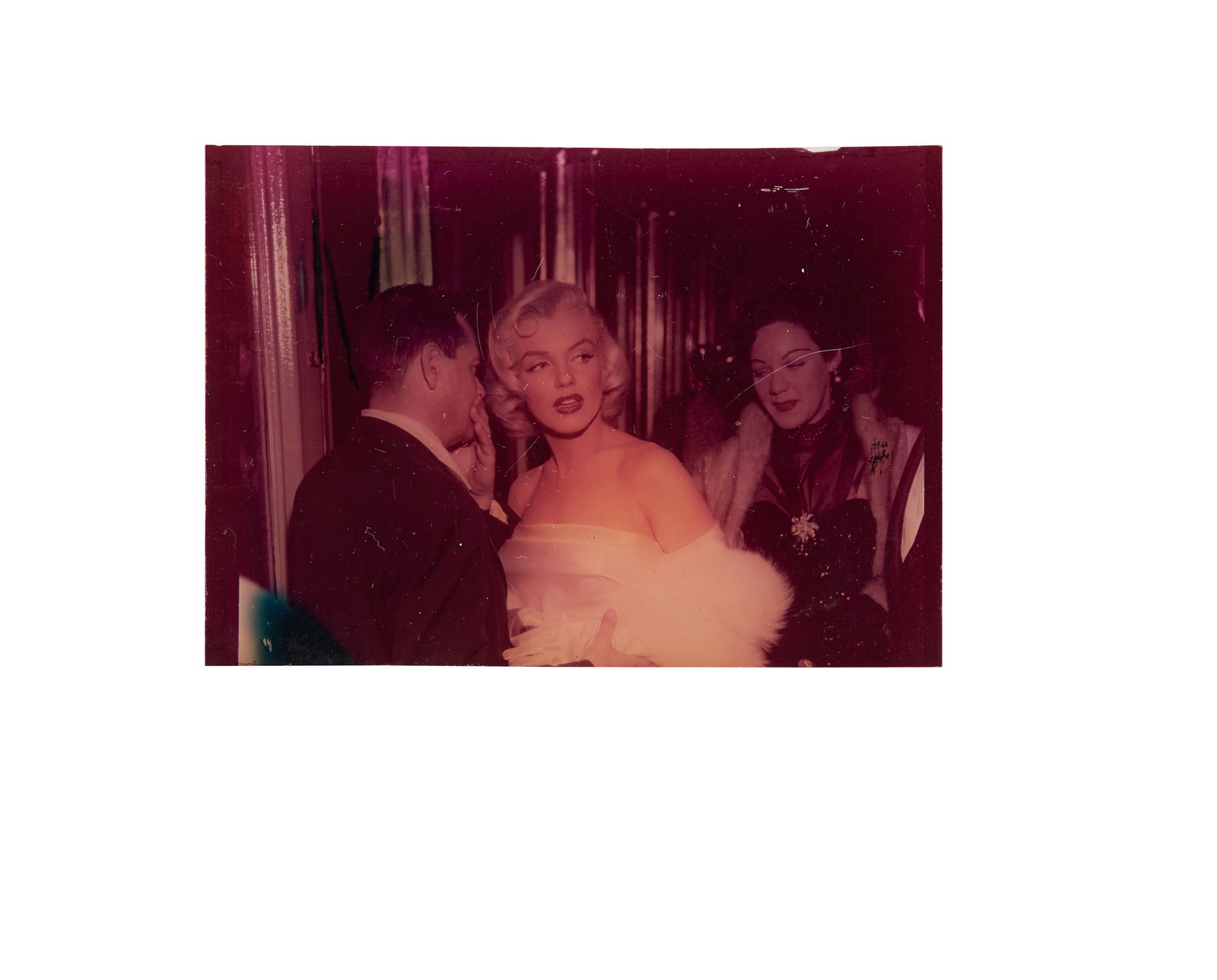 Marilyn Monroe | 1953 Rare Small Color Transparency: An original print; on film, depicting the star as others surround her at the March 4, 1953 Los Angeles premiere of the 20th Century Fox musical "Call Me Madam" which starred Ethel Merman and Donald