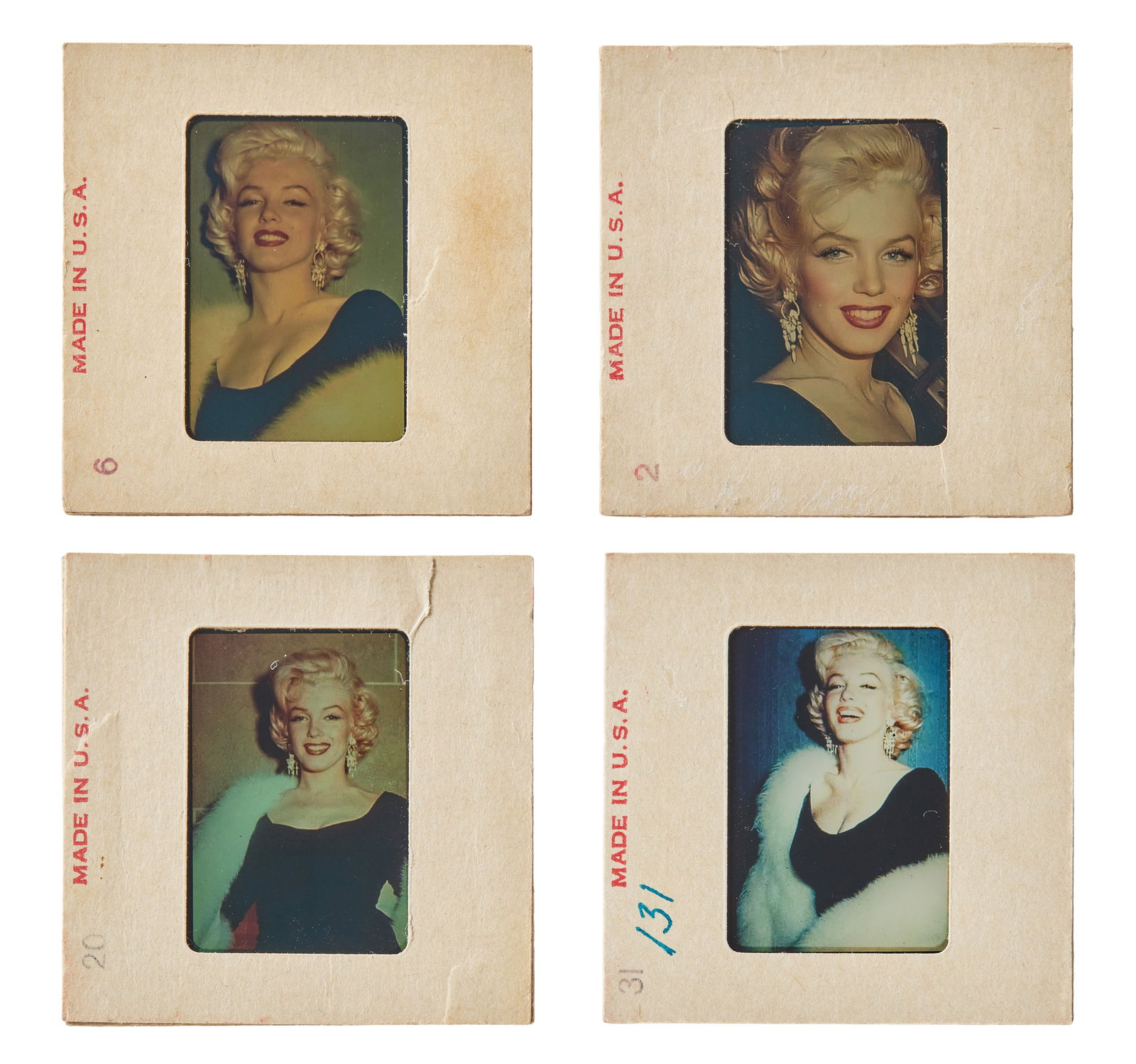 Marilyn Monroe | 1953 Rare Color Slides: A group of four; original prints, housed in cardboard sleeves with text on one side reading in part "Kodachrome / Transparency" and on the other "Made in U.S.A.," all depicting the star looking