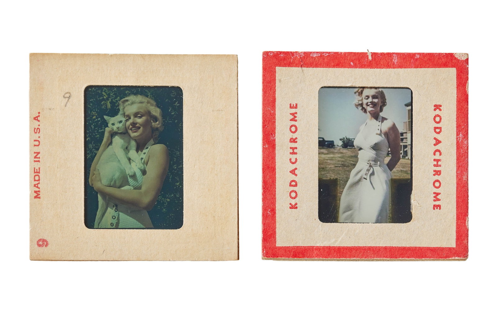 Marilyn Monroe | 1951 Rare Color Slides by Earl Leaf: A group of two; original prints, housed in cardboard sleeves noting "Kodachrome / Transparency" on one side and "Made in U.S.A." on the other; the first depicts the star wearing a white sundress and h