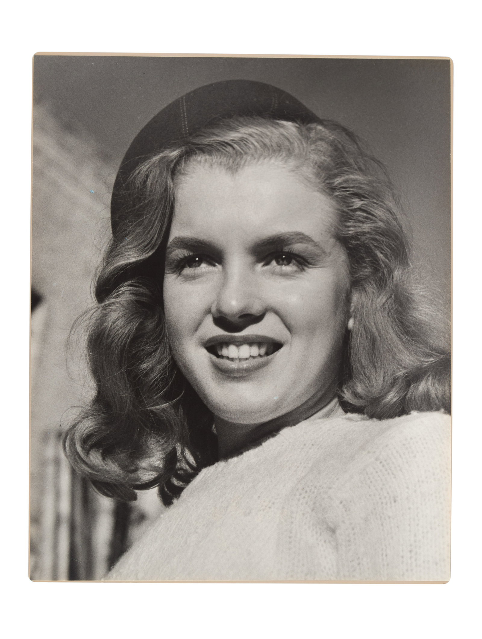 Marilyn Monroe | 1946/1987 Black and White Photograph Signed by Joseph Jasgur: A later 1987 print; large format, matte finish, mounted to a mat board, depicting a close-up of the pretty nineteen year-old in one of her very early modeling assignments; verso signed in black felt-t