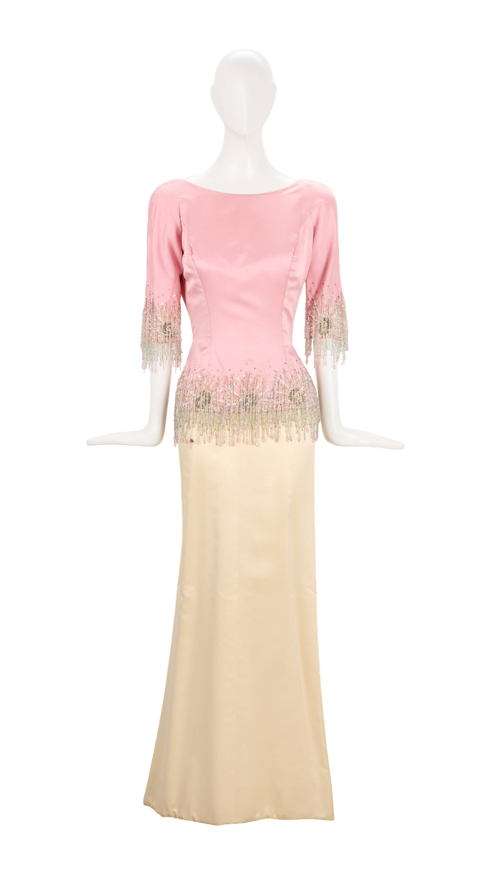 Ann-Margret | 1962 Gown Worn to the Academy Awards: A garment made of white silk; floor-length with slight train at back hem, spaghetti straps, back zip-up closure, with a separate and removeable top portion made of pale pink silk, short sleeves,