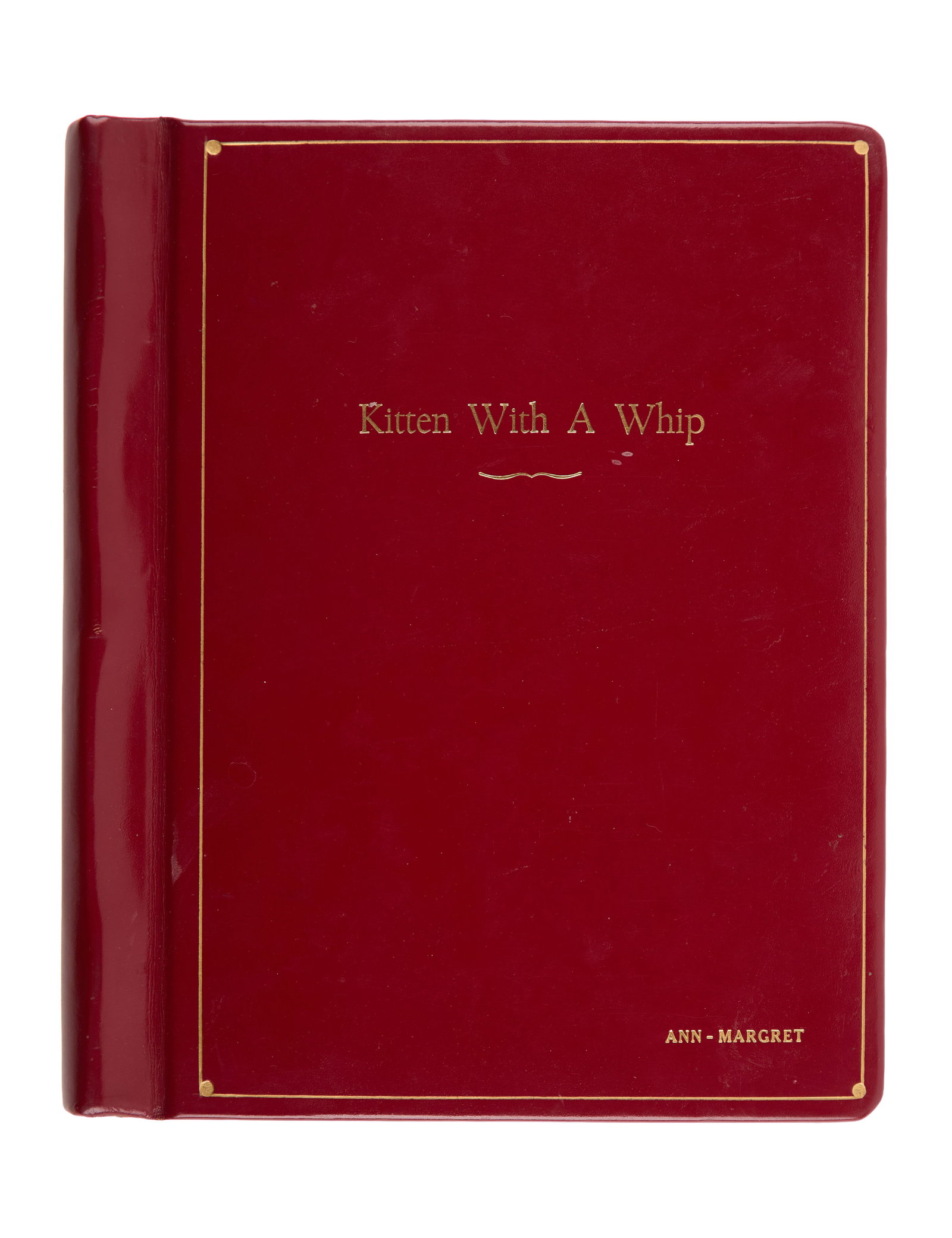 Ann-Margret | 1964 Library Copy Script from "Kitten With A Whip": Universal, 1964; elegant red leather covers, film title and star's name embossed in gold-tone ink on cover, marked "Final," dated "1/2/ 64," screenplay by Douglas Heyes, 122 pages, with a number of co