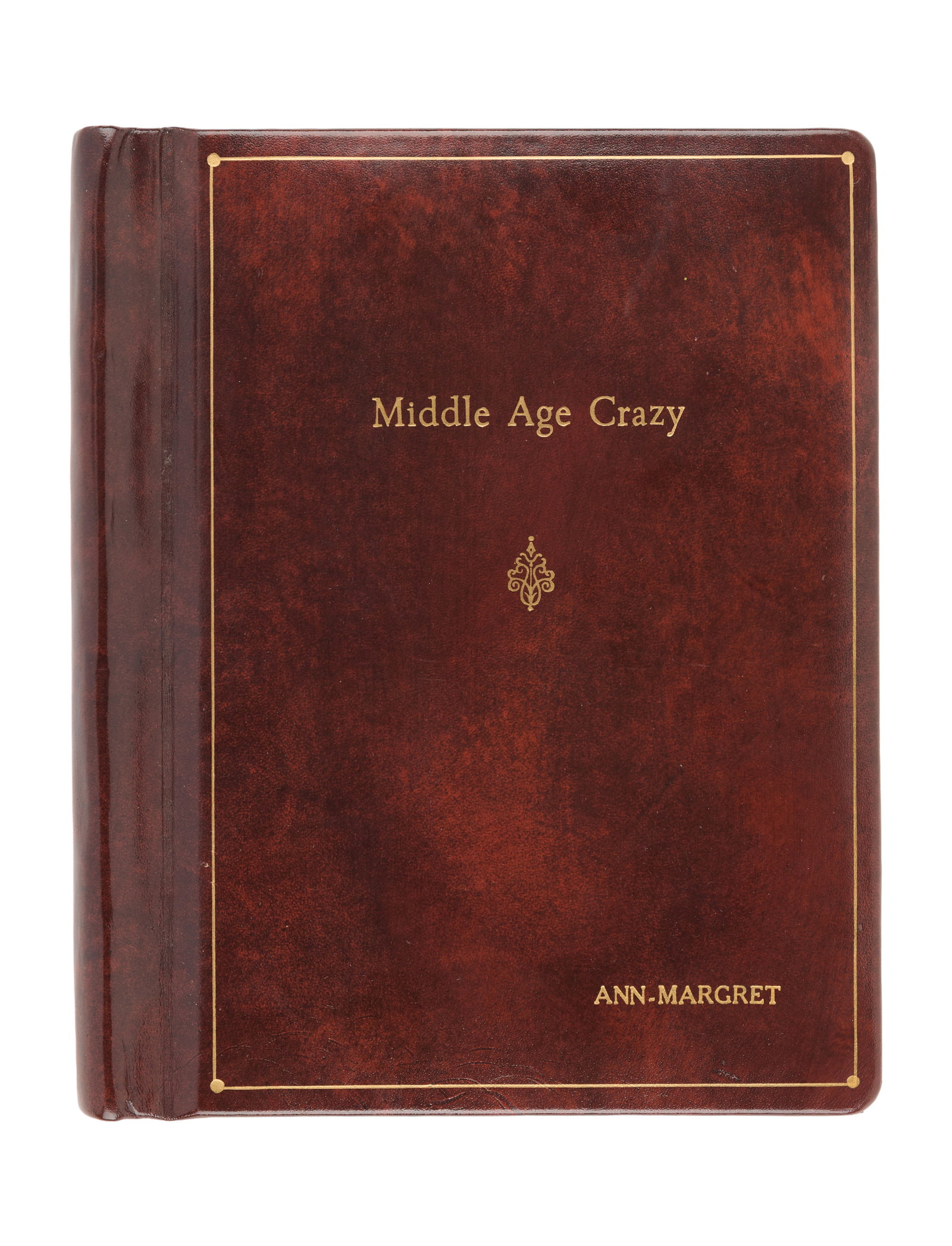 Ann-Margret | 1979 Library Copy Script from "Middle Age Crazy": 20th Century Fox, 1980; elegant brown leather covers, title and star's name embossed in gold-tone ink on cover, interior black covers, marked "Final," dated "May 14, 1979" and "7-79," screenplay by Ca