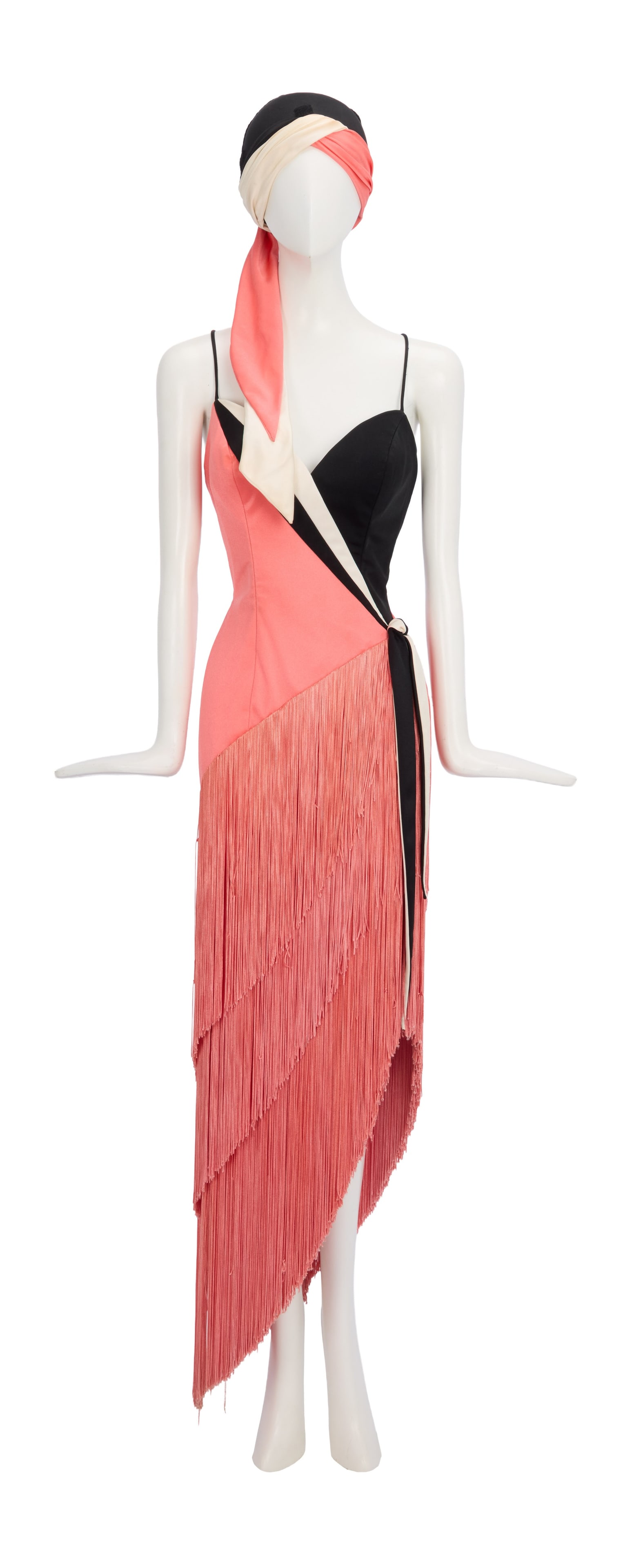 Ann-Margret | 1980s Stage-Worn Flapper Dress by Bob Mackie: A garment made of bubble gum pink and black nylon; three layers of pink fringe on the skirt portion, asymmetrical hem, bodice is pink, black and white ending in a decorative tie at left waist, spaghet