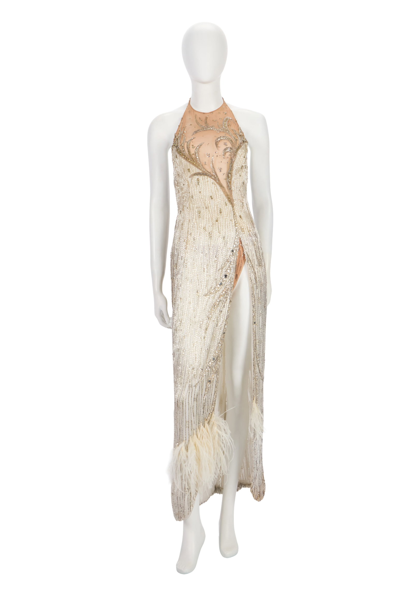 Ann-Margret | 1970s Stage-Worn White Gown: A halter-top style; floor-length, made of nude-colored silk at bust with rest of garment made of white silk, entirely adorned with silver-colored sequins, bugle beads and rhinestones, large slit up