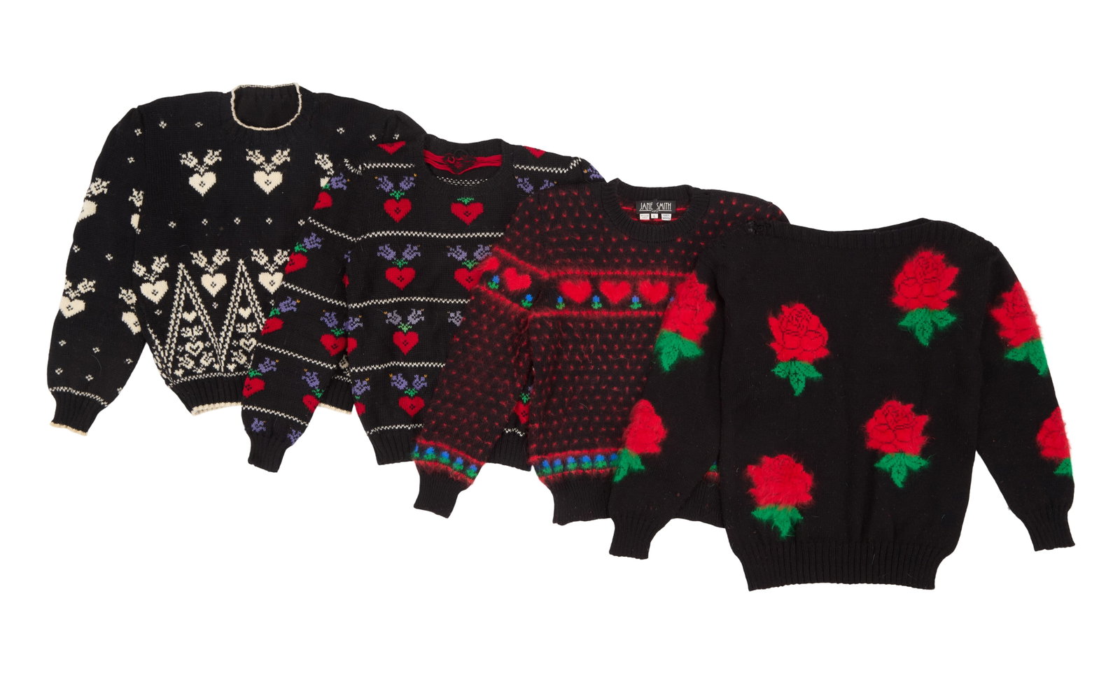 Ann-Margret | 1980s "Girly" Sweaters: A group of four; the first a black wool-blend crewneck with a white heart pattern, no label or size present; the second a black wool-blend crewneck with a red heart pattern, no label or size present;