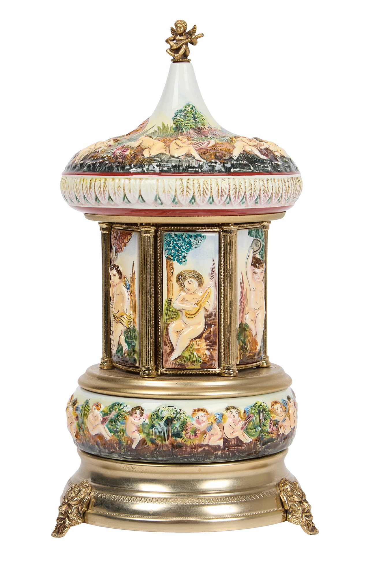 Ann Margret | 1976 Capodimonte "Lipstick Carousel" Music Box by Reuge: An ornate piece made of porcelain; when wound-up six panels open to reveal compartments for either tubes of lipstick cigarettes or matches while playing a few bars of "Lara's Theme" and "Strangers in 