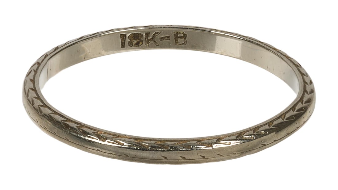 Ann-Margret | 1960s 18K White Gold Ring Band: A very narrow piece with allover engraved detail; ring size 8, 1.7 grams; marked 18k; likely Roger Smith's ring.
