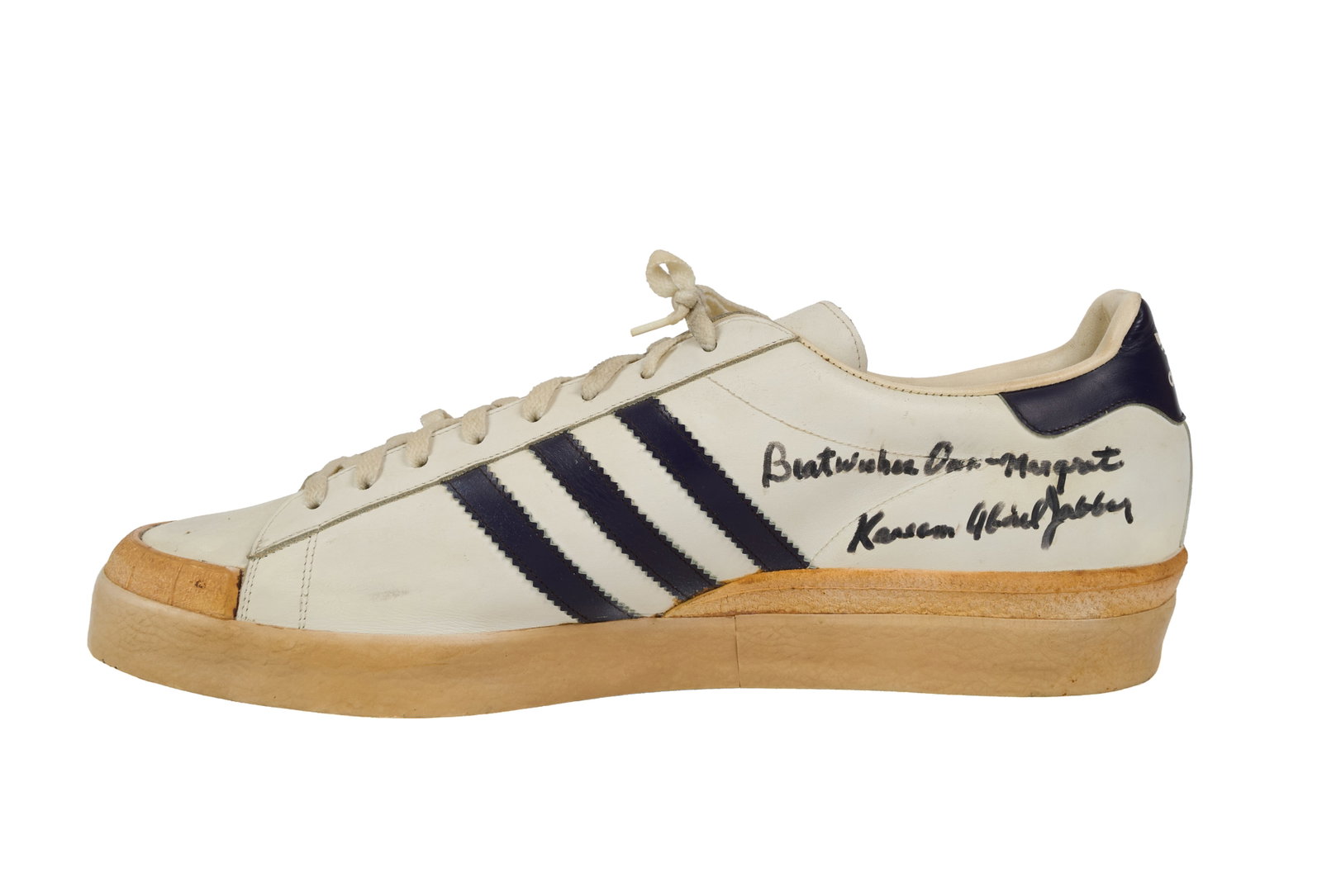 Ann-Margret | 1980s Sneaker Signed by Kareem Abdul-Jabbar: A very large never-worn right-foot Adidas shoe; signed in black felt-tip ink on the inner portion "Best wishes Ann-Margret / Kareem Abdul-Jabbar."
