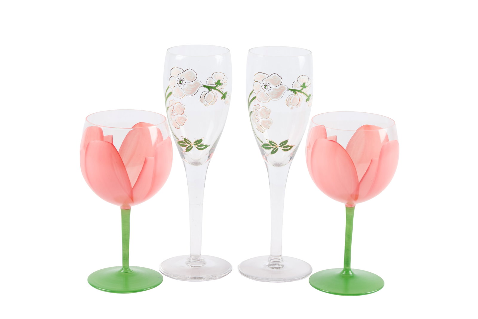 Ann-Margret | 2000s Wine Glasses: A group of four; two small ones with a hand-painted pink tulip motif; and two champagne flutes with a hand-painted white floral motif.