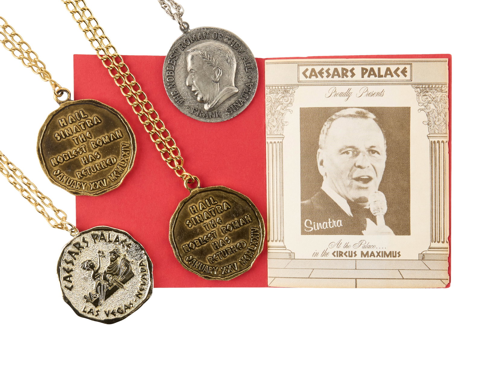 Frank Sinatra | 1970s Medallions and Booklet from Caesars Palace: A group of five items; all related to the singer's various performances at the famous Las Vegas hotel; including two gold-tone metal medallions on chains from 1974; one silver-tone metal medallion on