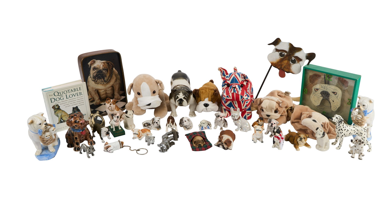 Samantha Eggar | Dog Figurines and Stuffed Animals: Samantha Eggar's large collection (over 35 pieces) of dog tchotchkes, including many figurines, salt and pepper shakers, and coin banks (porcelain, ceramic, wood), five stuffed animals, two clocks, an