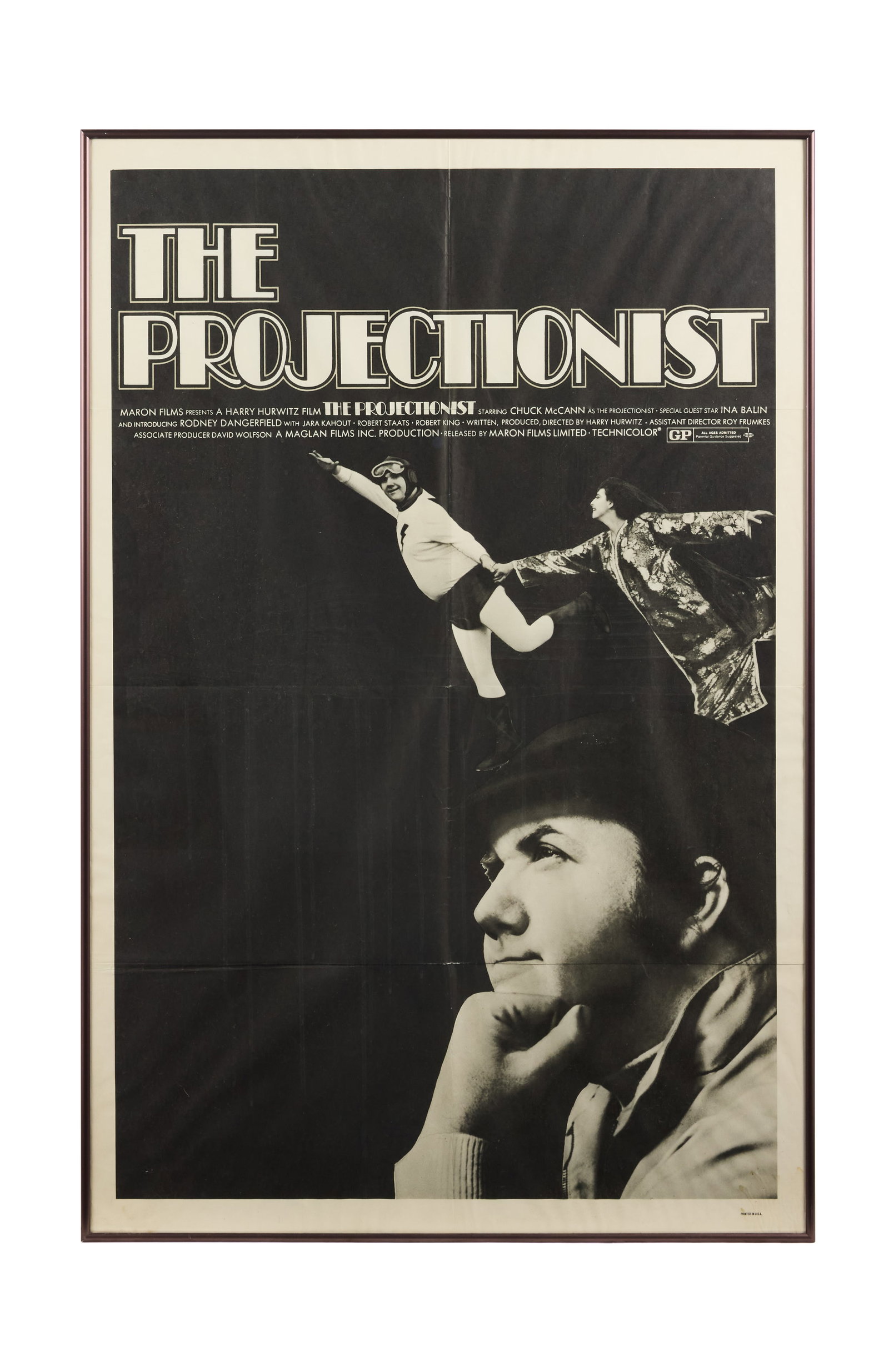 The Projectionist | Movie Posters: Maron Films, 1971. One-sheet posters, 27" x 41" and 20" x 28". Water damage/warping to larger poster; some color loss along folds in smaller poster. The Projectionist, directed by Harry Hurwitz and