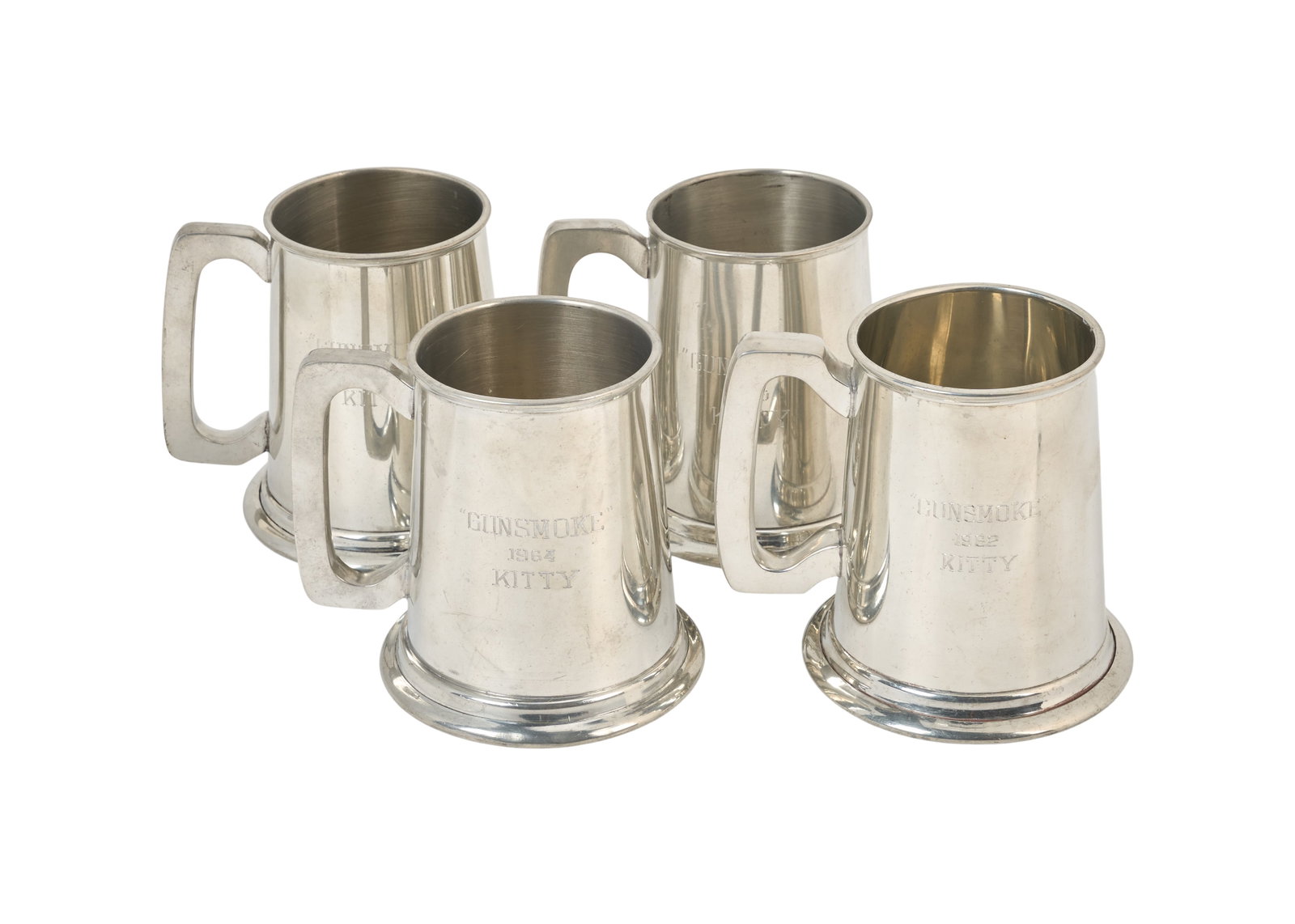 Gunsmoke | 1960s Four Miss Kitty (Amanda Blake) Metal Tankards (A): CBS, 1955-1975. A collection of four metal commemorative tankards given to Amanda Blake, who portrayed the beloved character Miss Kitty on the beloved TV Western for twenty years. These tankards were