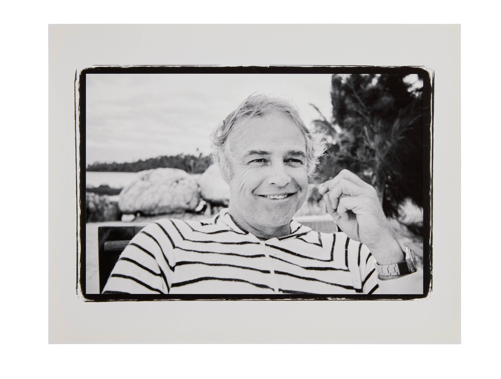 Marlon Brando | 1978 Portrait by Lawrence Grobel (D): Original print, double-weight paper, matte finish. A black and white portrait of Marlon Brando at his Tahitian atoll, Teti'aroa. This photograph of the star was taken by journalist Larry Grobel, who