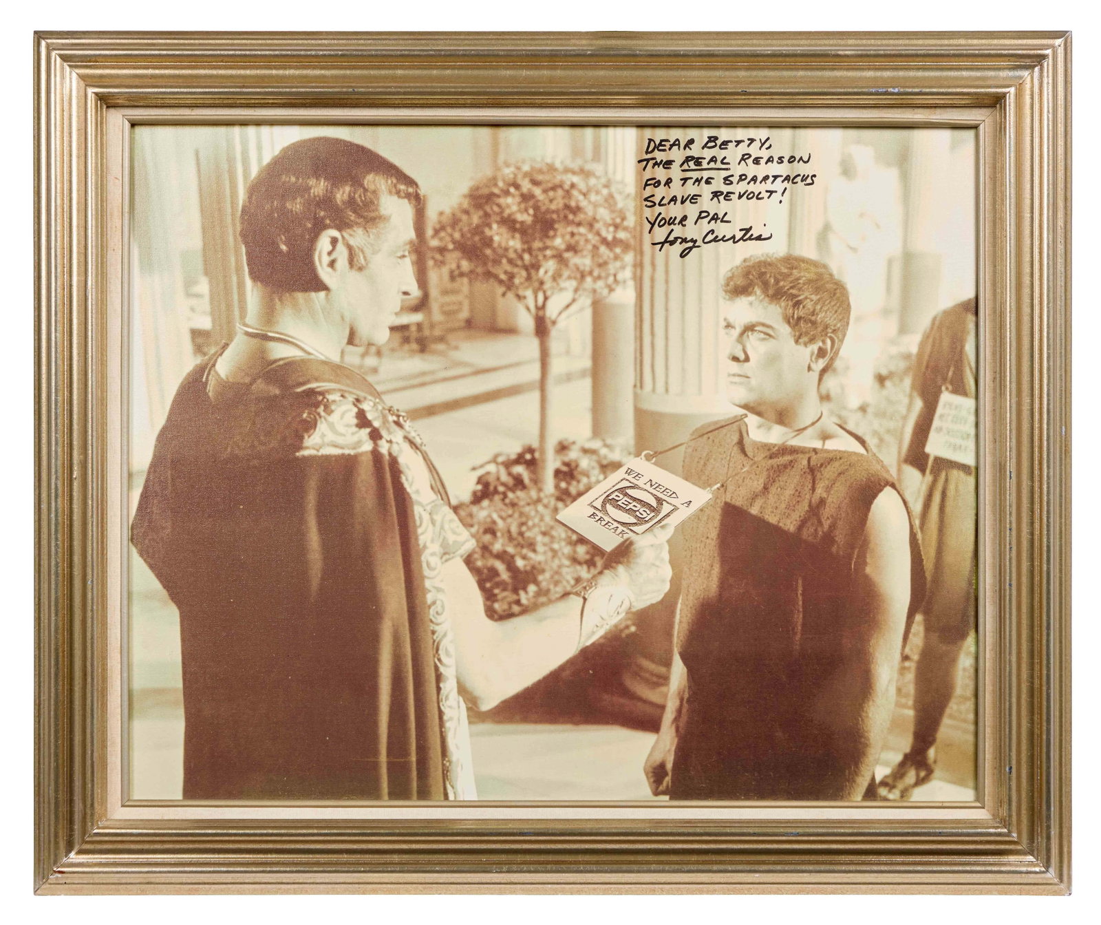 Tony Curtis | Signed Altered Film Still from "Spartacus": A sepia tone still from Spartacus (Universal International, 1960) directed by Stanley Kubrick, printed on canvas, of the scene in which Crassus (Lawrence Olivier) inspects a sign hanging from the neck