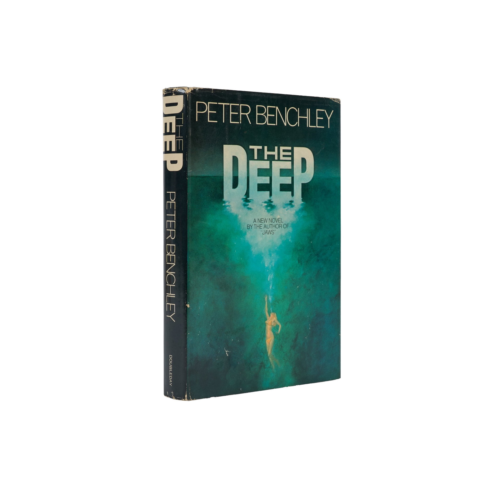 Nick Nolte | Signed Copy of The Deep: BENCHLEY, PETER. The Deep. Garden City: Doubleday, 1976. 8vo. Original cloth, unclipped dust jacket. Toning, shelf wear to jacket. FIRST EDITION. Signed by Nick Nolte, star of Peter Yates' 1977 film