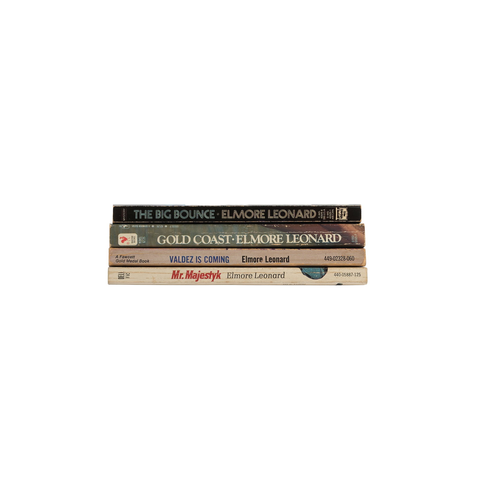 Elmore Leonard | Four Books, Three Signed to Lawrence Grobel: LEONARD, ELMORE. Mr. Majestyk. New York: Dell Publishing Co., Inc., 1974. 12mo. Softcover. Light toning to color, creasing to spine. FIRST EDITION. Signed and inscribed by the author to Larry Grobel