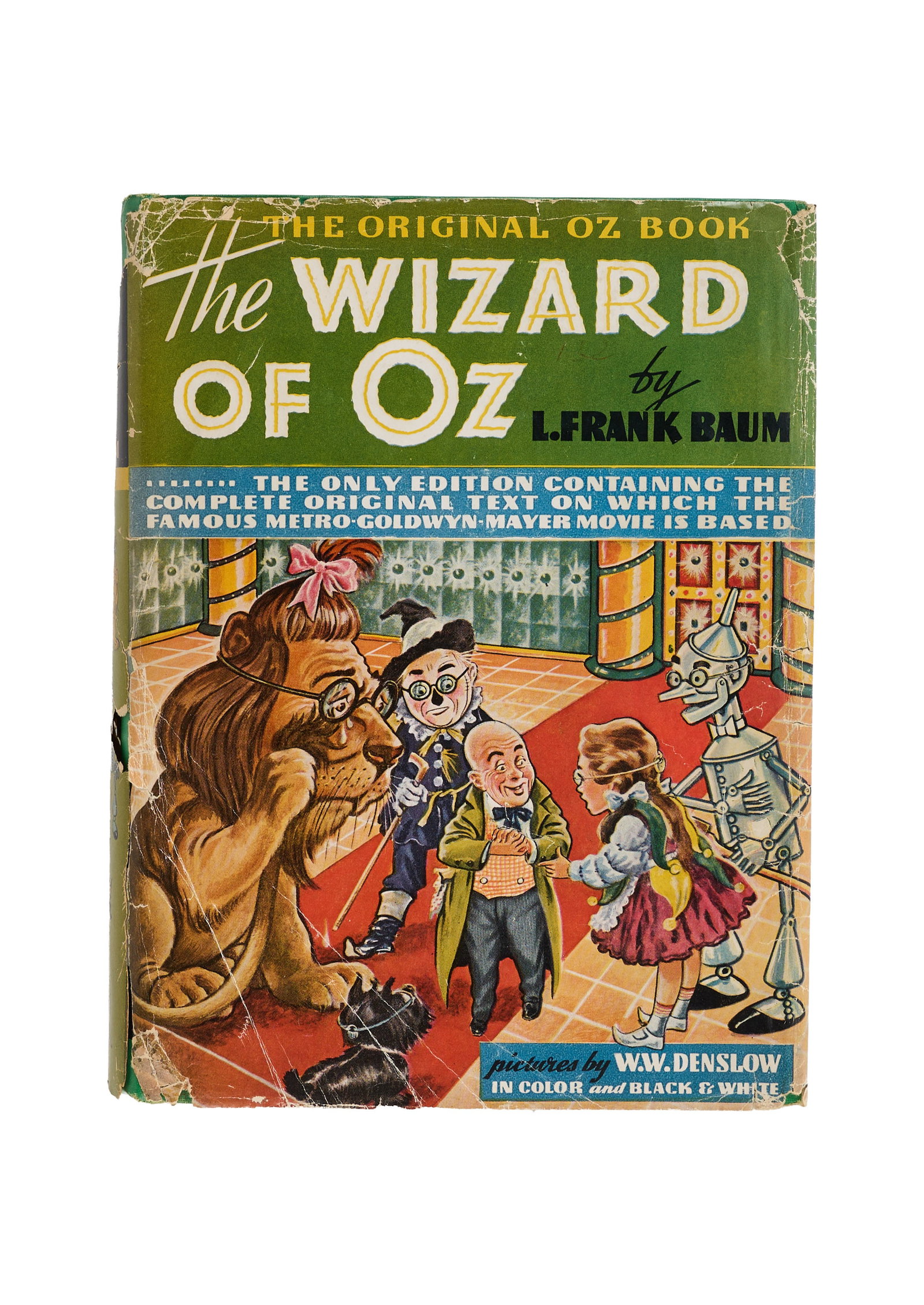 The Wizard of Oz | 1939 Movie-Tie-In Book Signed by 18 "Munchkin" Actors: Baum, L. Frank, with pictures by W.W. Denslow. The Wizard of Oz. Indianapolis: The Bobbs-Merrill Company, 1899. 8vo, cloth, dust jacket present. 1939 movie tie-in edition. Signed by 18 actors who