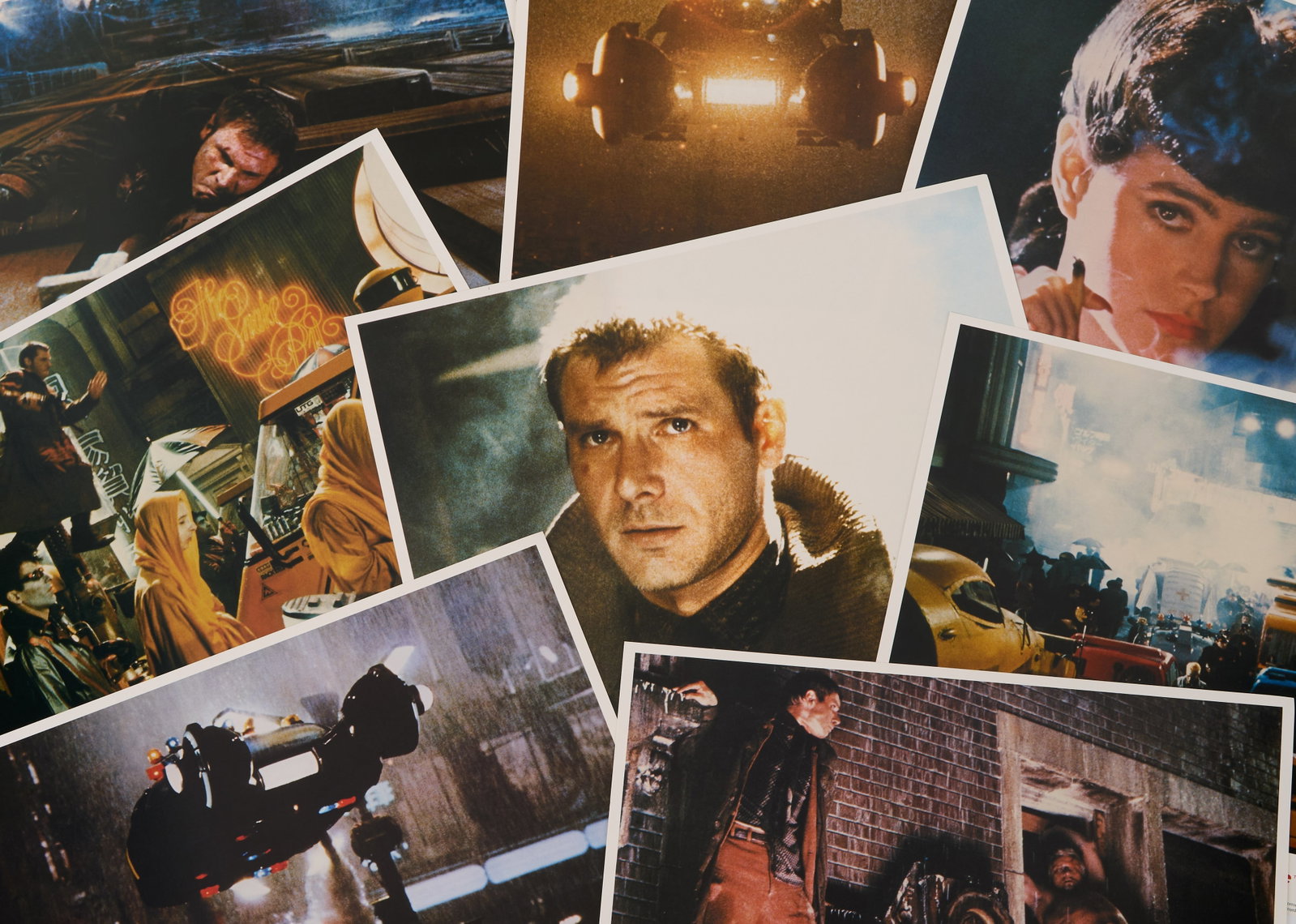 Blade Runner | Lobby Cards: A group of eight lobby cards from the original theatrical release of Blade Runner (Waner Bros., 1982), directed by Ridley Scott. The lobby cards each have the Blade Runner title treatment on them and