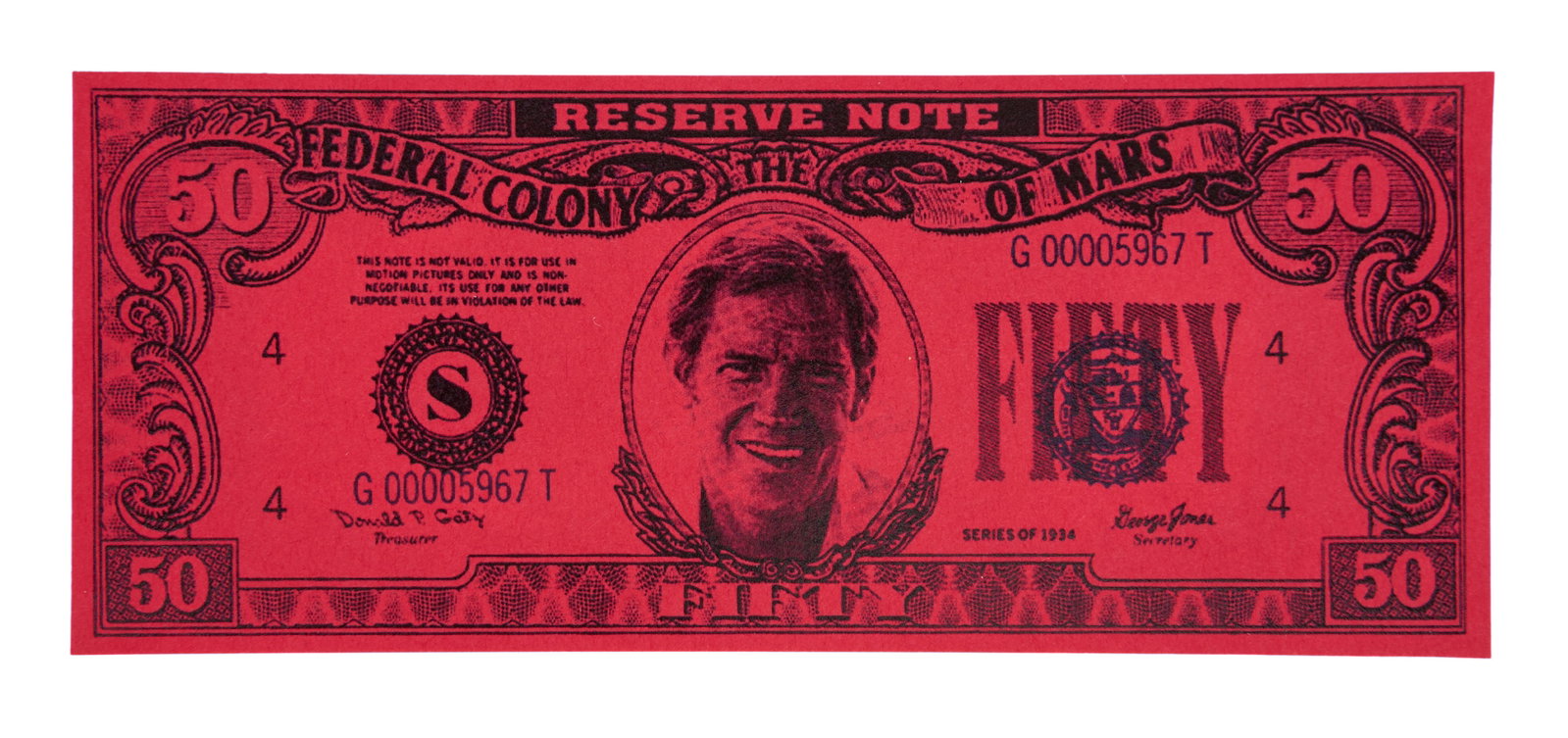 Total Recall | Mars Money Prop: A $50 Mars Money prop from the production of Total Recall (Tri-Star Pictures, 1990) directed by Paul Verhoeven and starring Arnold Schwarzenneger. This prop bank note was part of the original overrun