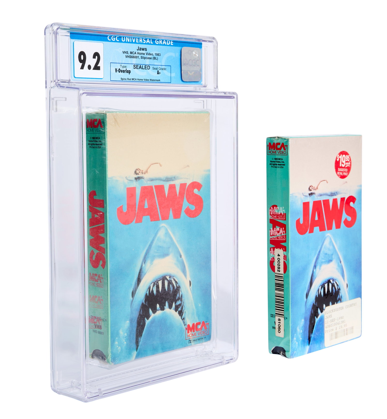 Jaws | Two Mint, Sealed 1983 VHS Tapes (One Graded): Two sealed copies of the 1983 VHS release of Jaws (Universal Pictures, 1975), one graded 9.2 with an A+ seal grade and one ungraded. The graded VHS tape has red MCA Home Video watermarks on the spine