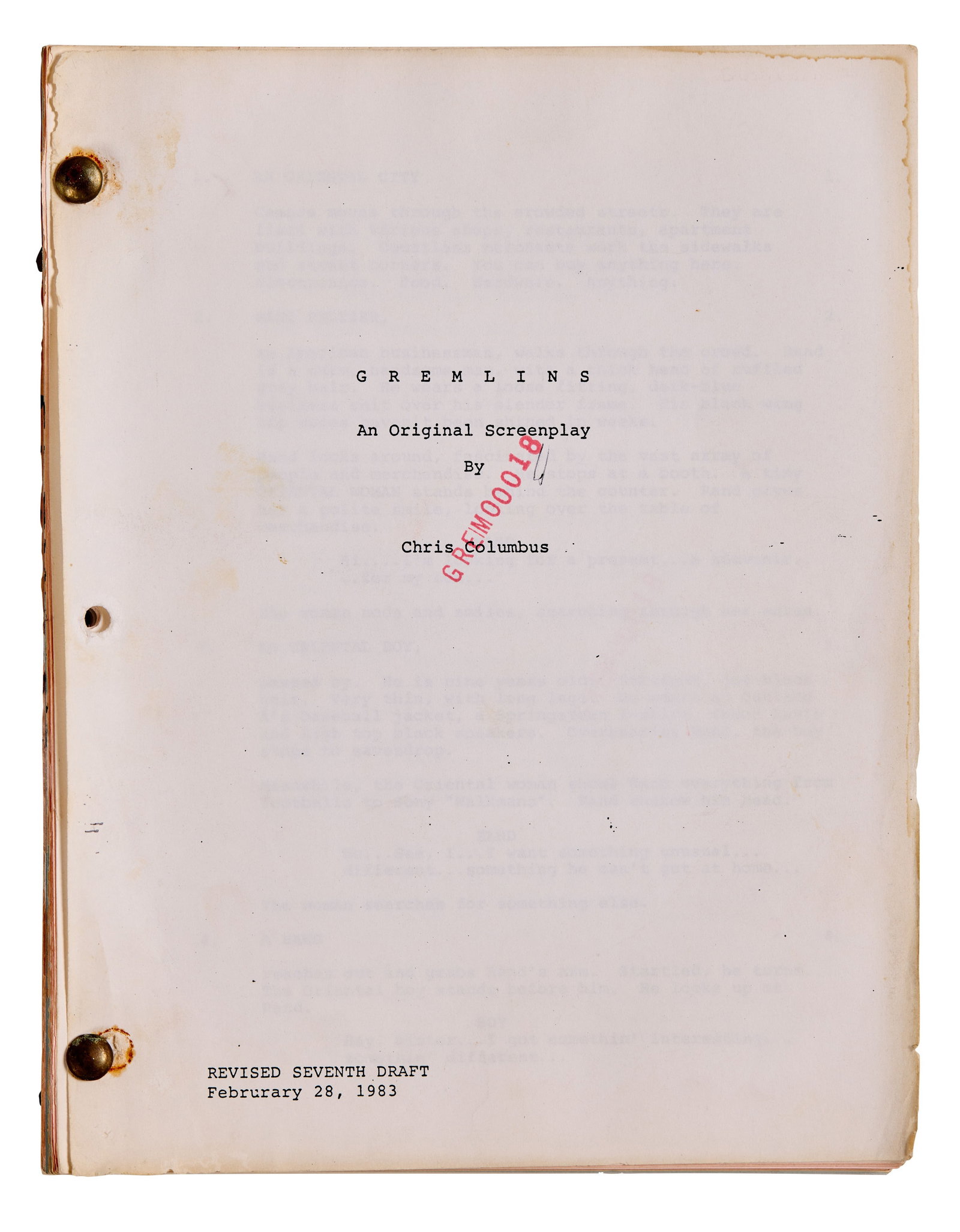 Gremlins | 1983 Production Script with "Rough Cut" Scenes: An original revised seventh draft script from the production of Gremlins (Warner Bros., 1984) by Chris Columbus, bound with brads, printed on blue, white, and pink revision pages, and dated February