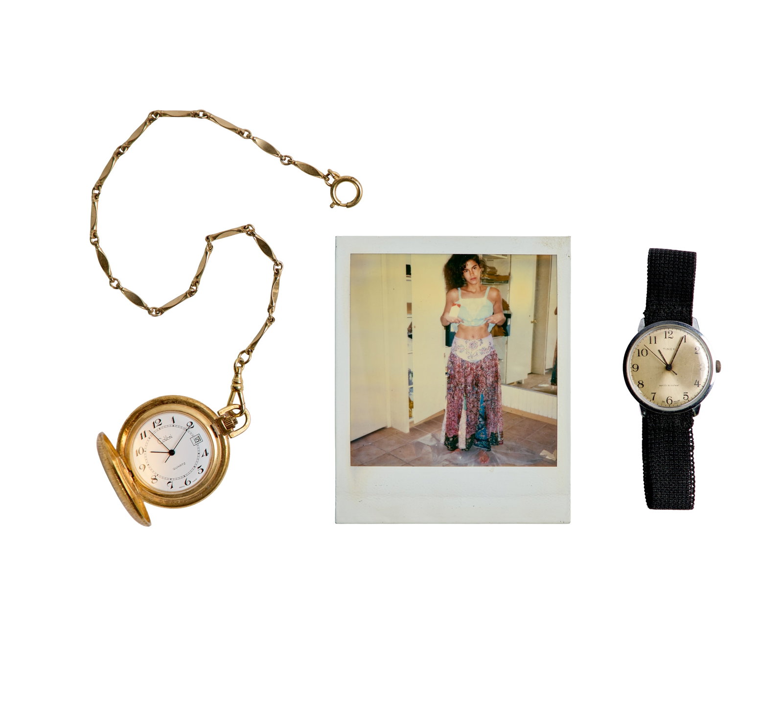 The Lost Boys | Jami Gertz Costume Fitting Polaroid with Unused Watches for Kiefer Sutherland's: An original Polaroid of Jami Gertz from her costume fitting session for the vampire film The Lost Boys (Warner Bros, 1987). Together with two watches, which were sourced to be used as buttons on the
