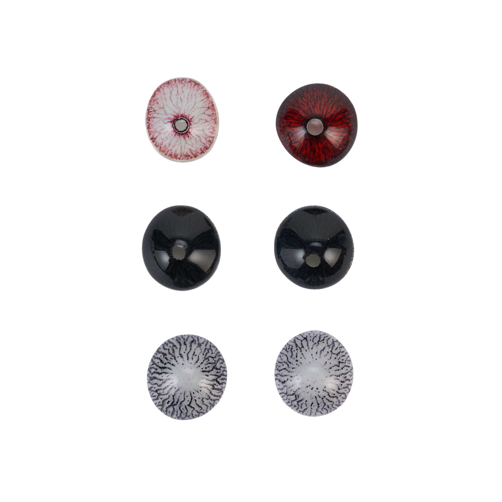 Innocent Blood | Steve Johnson Eye Props and SFX Magazine: A group of six vampire contact lenses made by Steve Johnson from the production of Innocent Blood (Warner Bros., 1992), directed by John Landis. Together with S.F.X Magazine No. 7, a French language