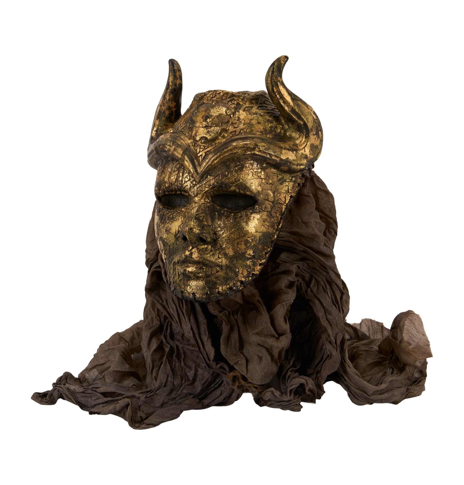 Game of Thrones | Sons of the Harpy Mask: A Sons of the Harpy mask from the production of Game of Thrones (HBO, 2011-2019). The horned mask is constructed from polyurethane and painted in gold-tones to appear metallic on camera, featuring