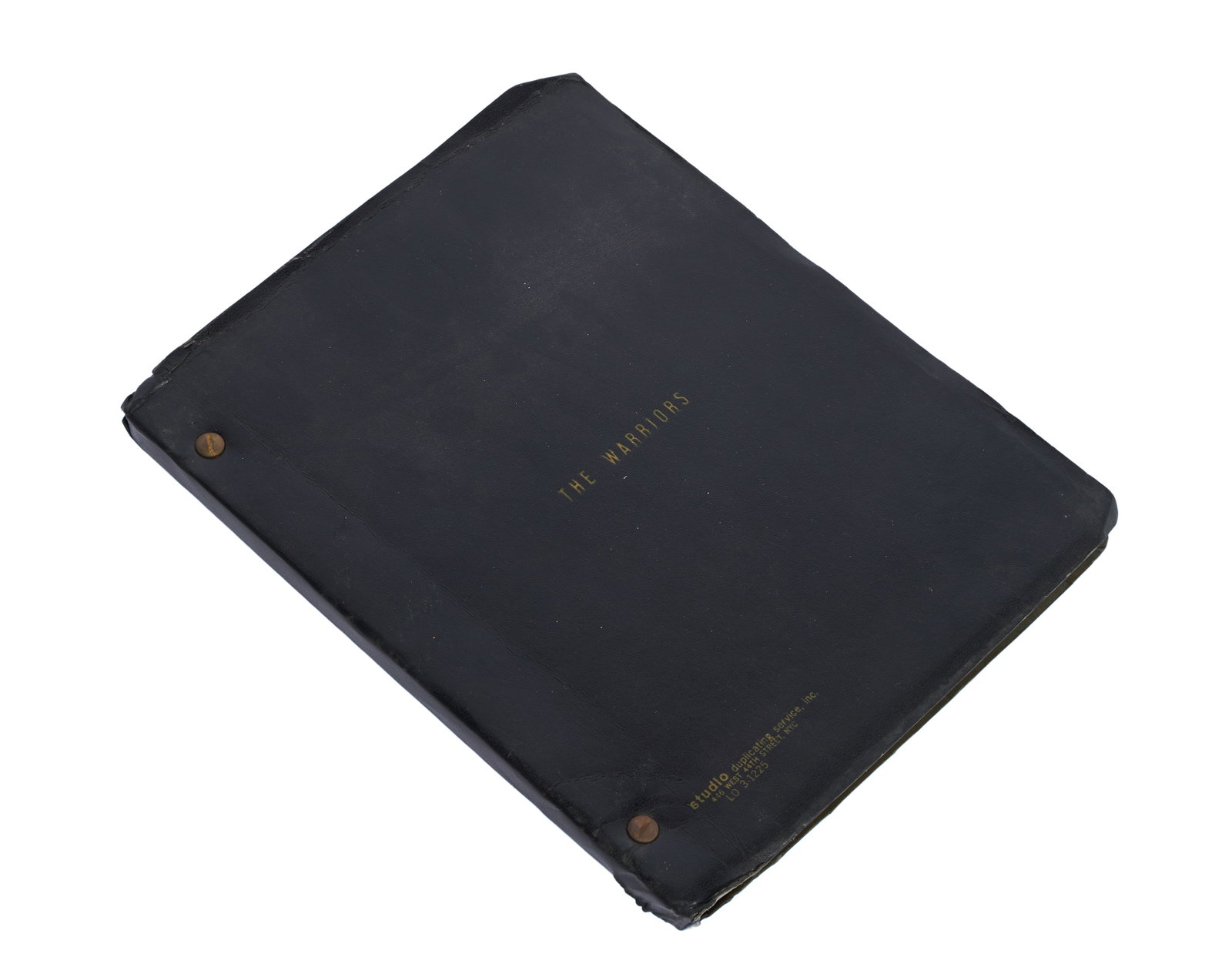 The Warriors | Production Script: An original production script for the cult classic gang thriller The Warriors (Paramount, 1979). Dated June 5, 1978, the script is bound in an imitation leather cover and printed on green paper. The t