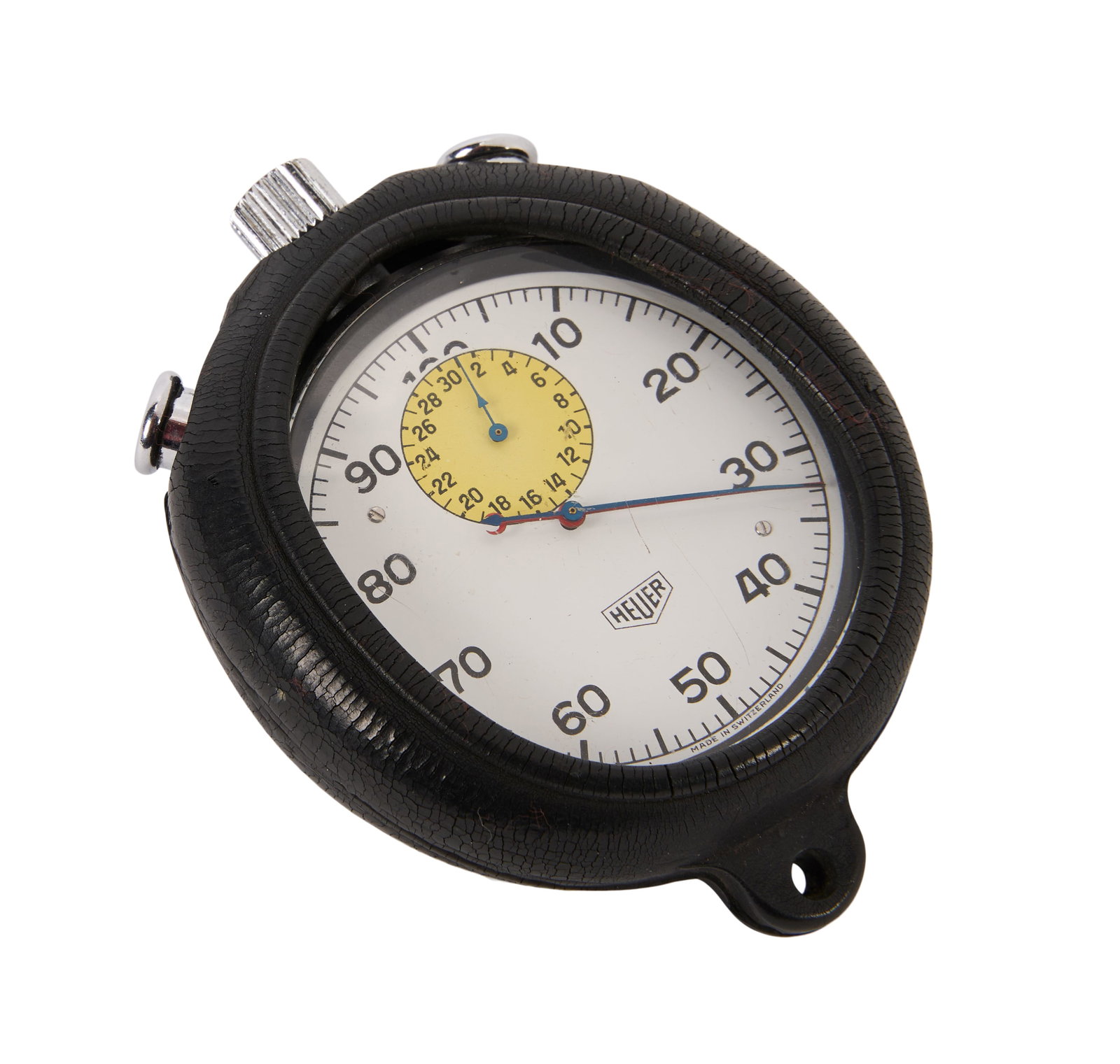 Steve McQueen | Stopwatch from "Le Mans": A Heur handheld timer stopwatch from the produciton of the Steve McQueen racing film Le Mans (National General Pictures, 1971). The stopwatch is housed in a Heur branded rubber sleeve and accompanied