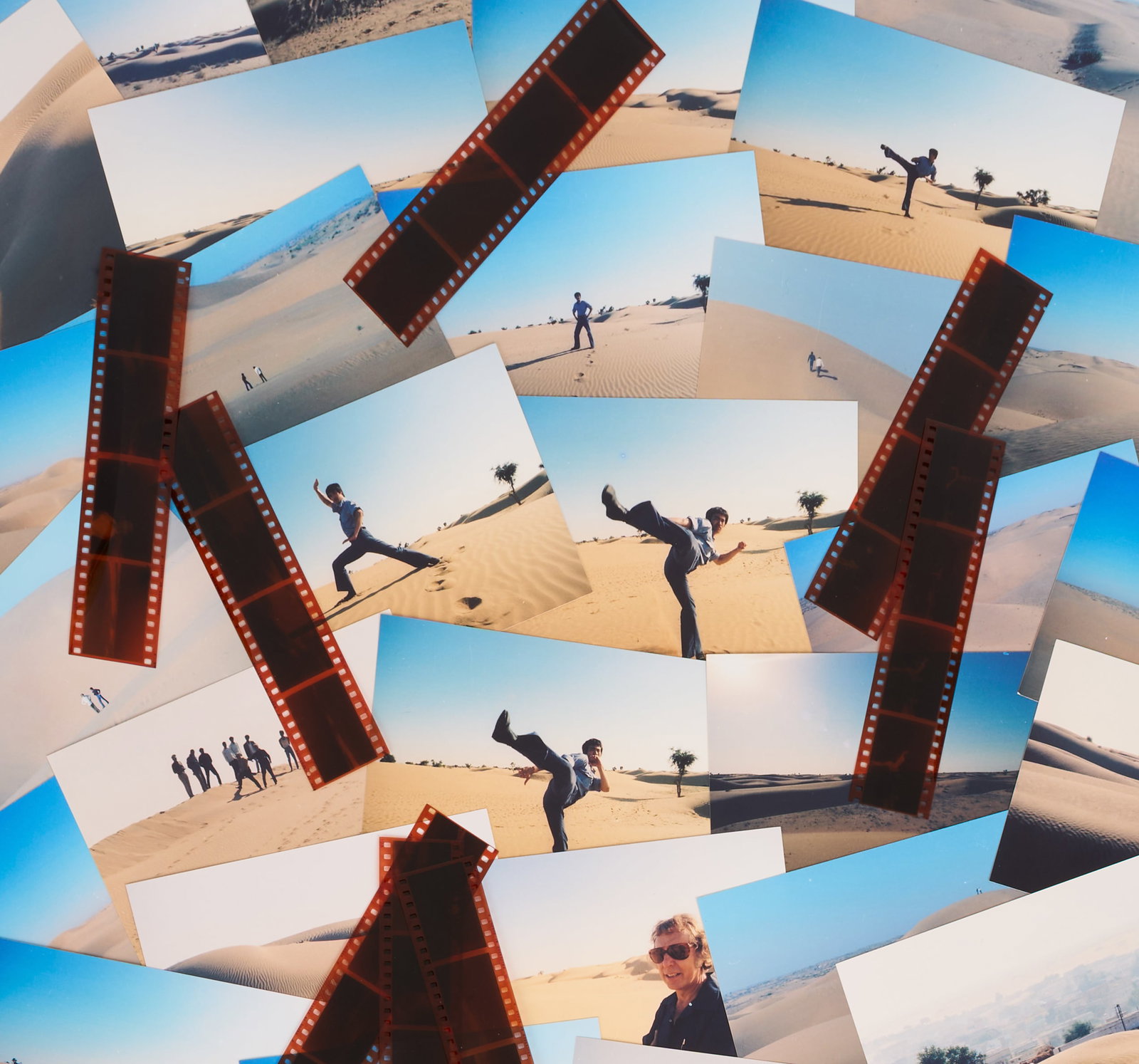 Bruce Lee | Group of Desert Photos: A set of eight original negatives of Bruce Lee, believed to be previously unseen. The photographs, taken in the desert, show Lee performing some of his signature combat movements. Accompanied by 32