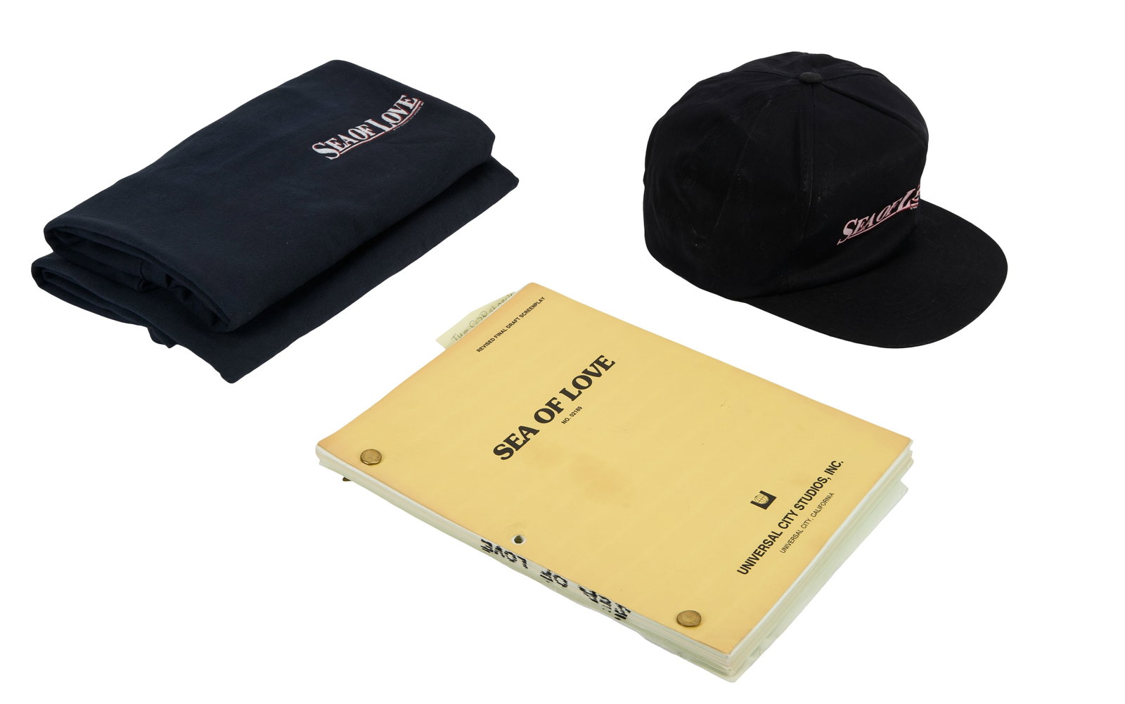 Sea of Love | Production Script with Shirts and Hat: An original production script for the Al Pacino-starring erotic thriller Sea of Love (Universal, 1989). This is a 116-page, multi-colored screenplay featuring a yellow cover page indicating it as the